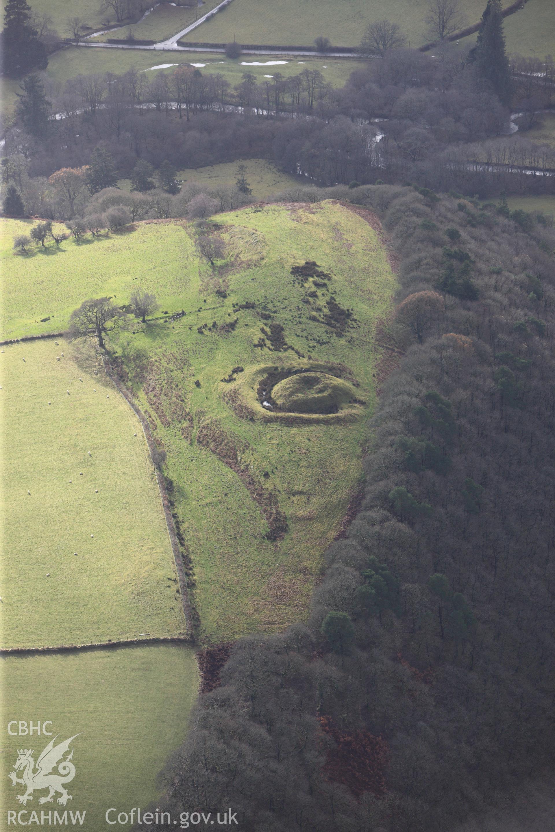 RCAHMW colour oblique photograph of Twdin mound with possilbe house platform visible above. Taken by Toby Driver on 23/11/2012.