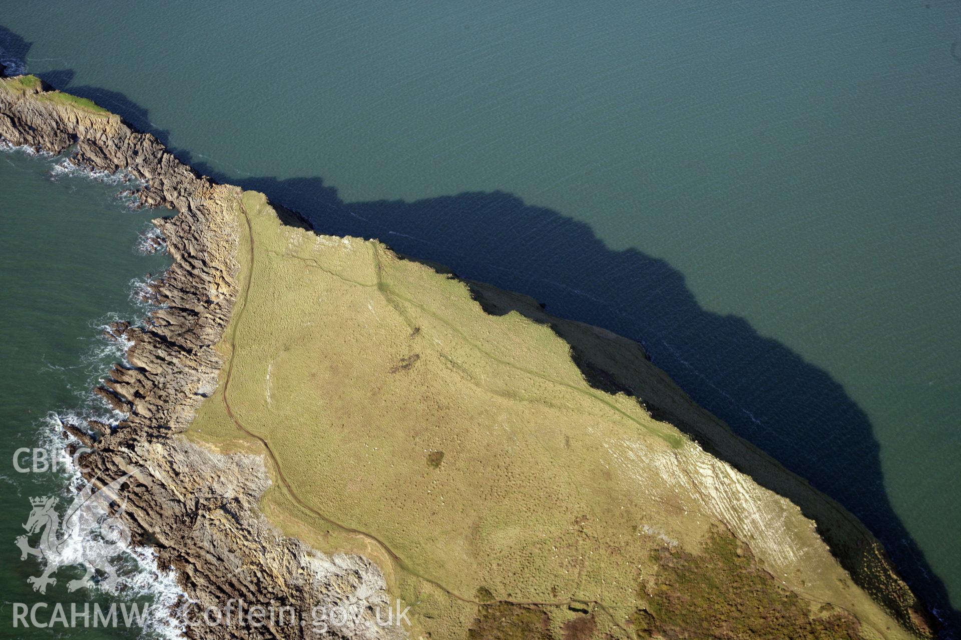 RCAHMW colour oblique photograph of Worms Head Camp. Taken by Toby Driver on 02/02/2012.