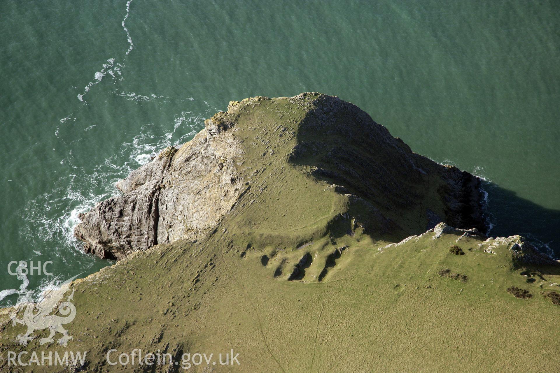 RCAHMW colour oblique photograph of Horsecliff Promontry Fort. Taken by Toby Driver on 02/02/2012.