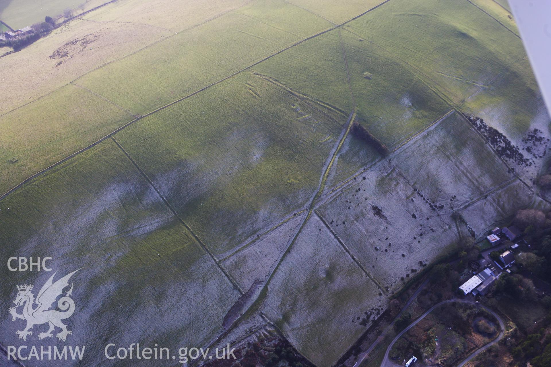 RCAHMW colour oblique photograph of Cwmsymlog lead mine, trial workings to south-west. Taken by Toby Driver on 07/02/2012.