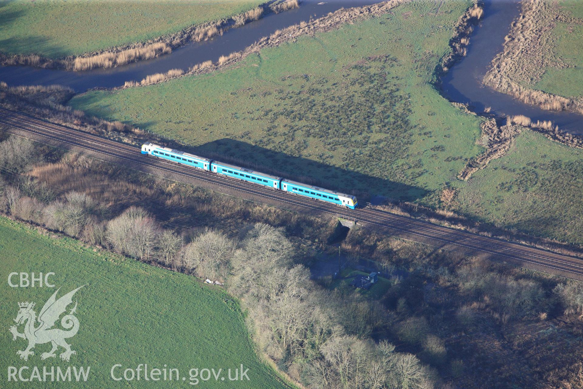 RCAHMW colour oblique photograph of Arriva Train, south of Ysgol Bro Myrddin, Carmarthen. Taken by Toby Driver on 27/01/2012.