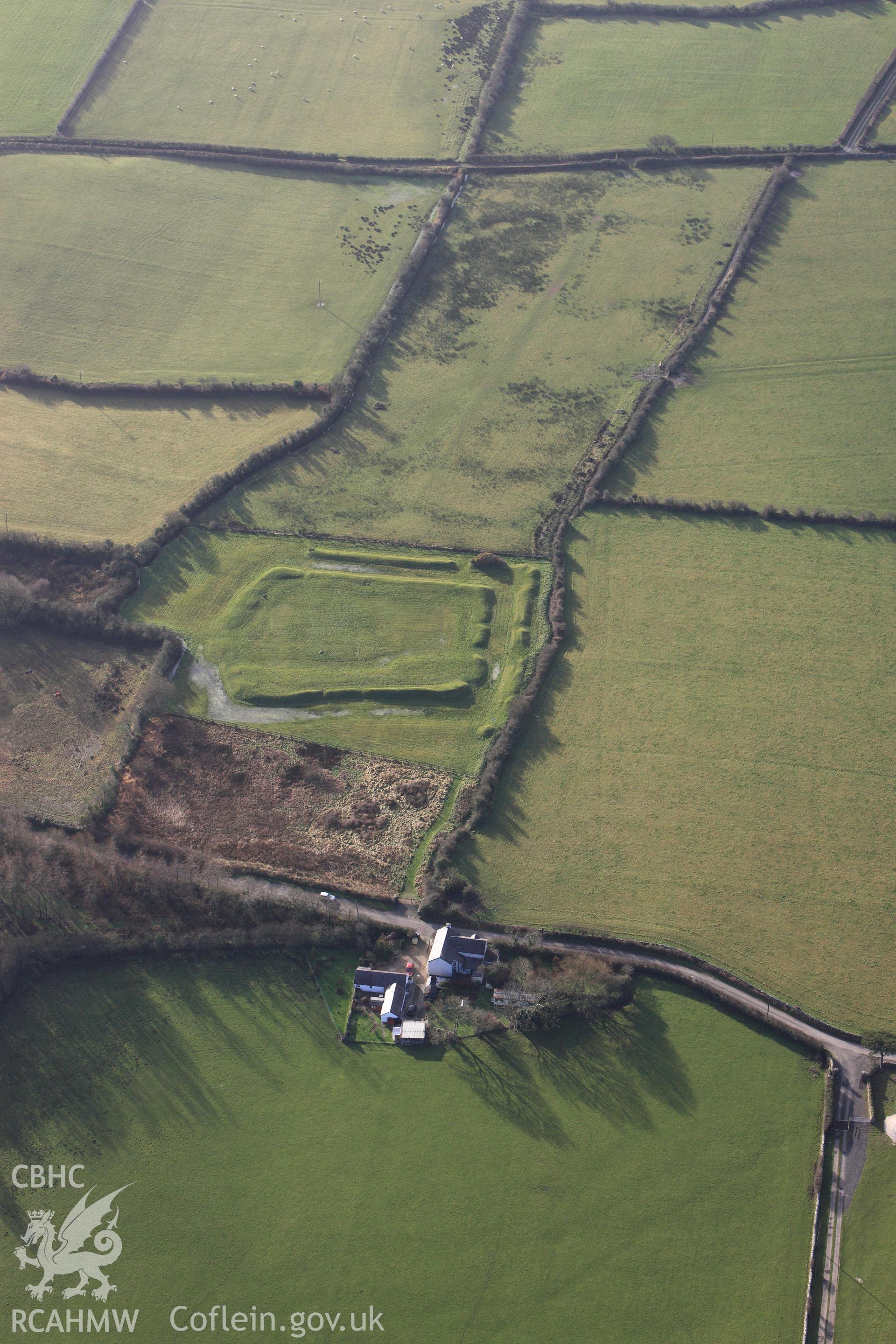 RCAHMW colour oblique photograph of Caer Leb earthwork, in low light. Taken by Toby Driver on 13/01/2012.