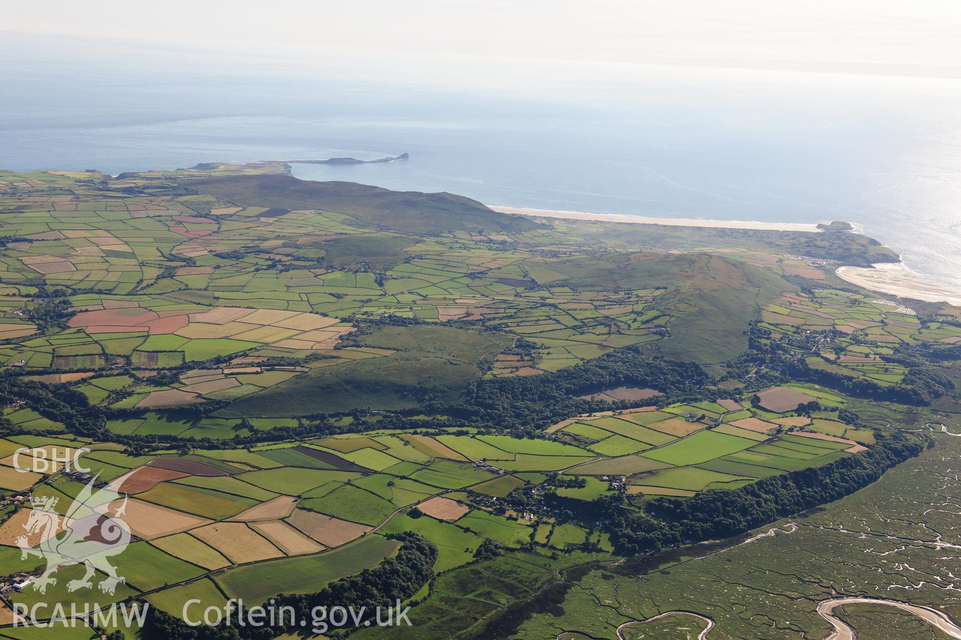 RCAHMW colour oblique photograph of West Gower, high landscape view over Llanmadoc Hill and Ryer's Down. Taken by Toby Driver on 24/07/2012.