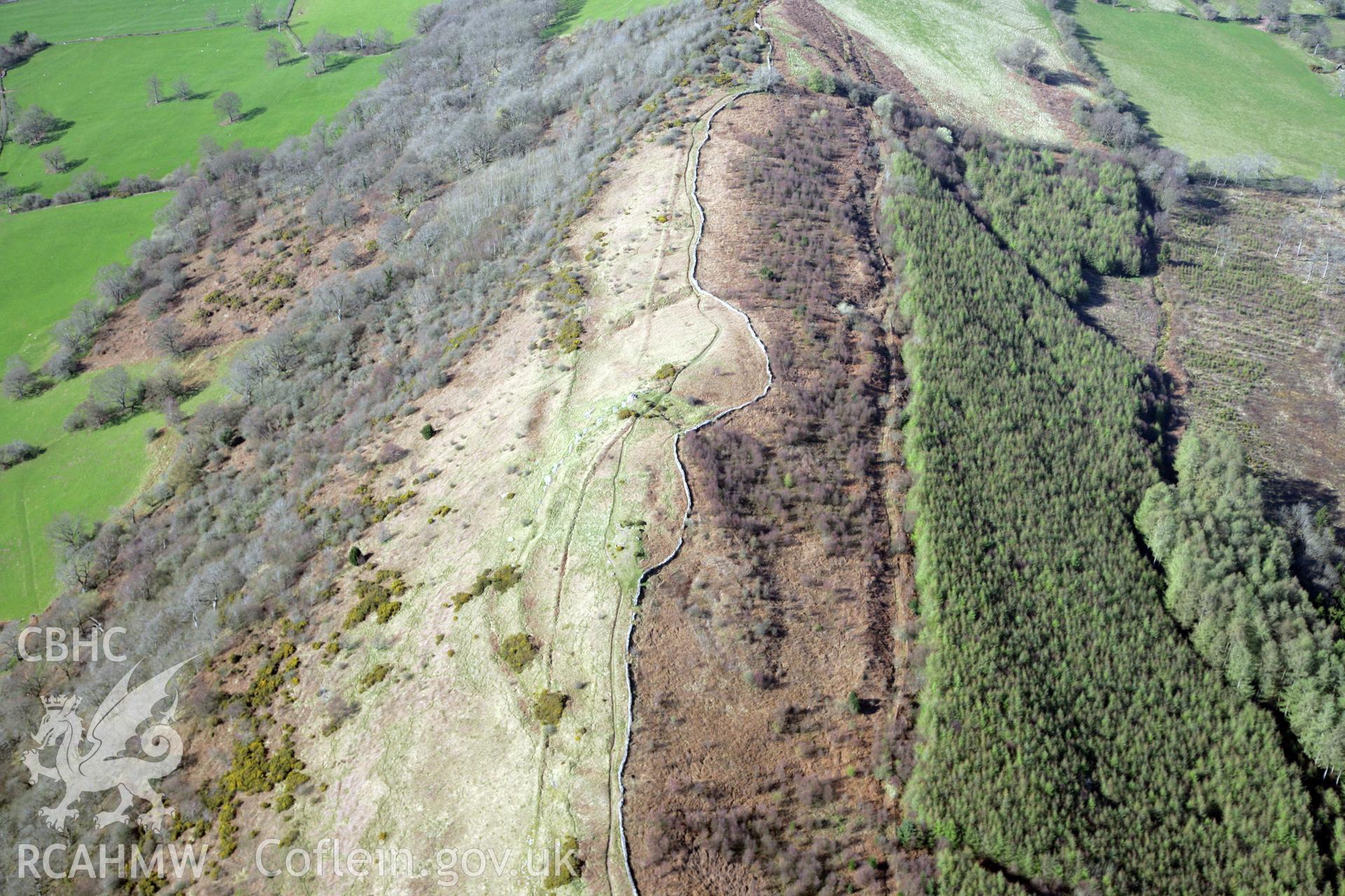 RCAHMW colour oblique photograph of Allt yr Esgair Hillfort. Taken by Toby Driver and Oliver Davies on 28/03/2012.