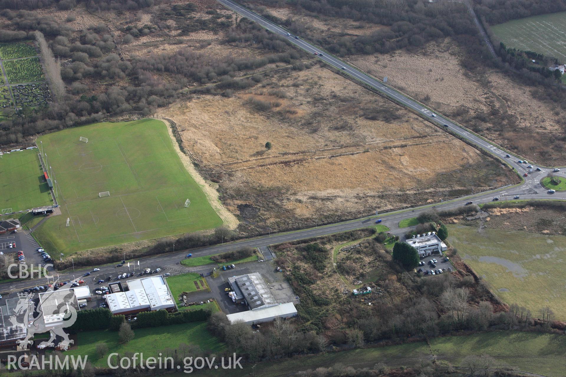 RCAHMW colour oblique photograph of Roman Military Enclosure on Stafford Common. Taken by Toby Driver on 27/01/2012.