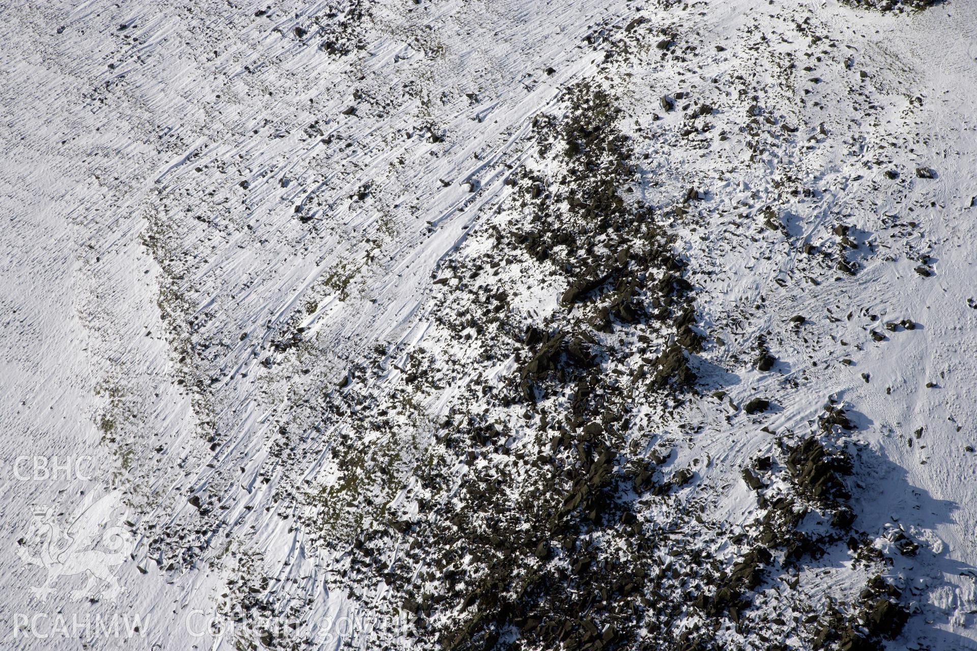 RCAHMW colour oblique photograph of Carn Meini Bluestone Outcrops of Spotted Dolerite. Taken by Toby Driver on 02/02/2012.