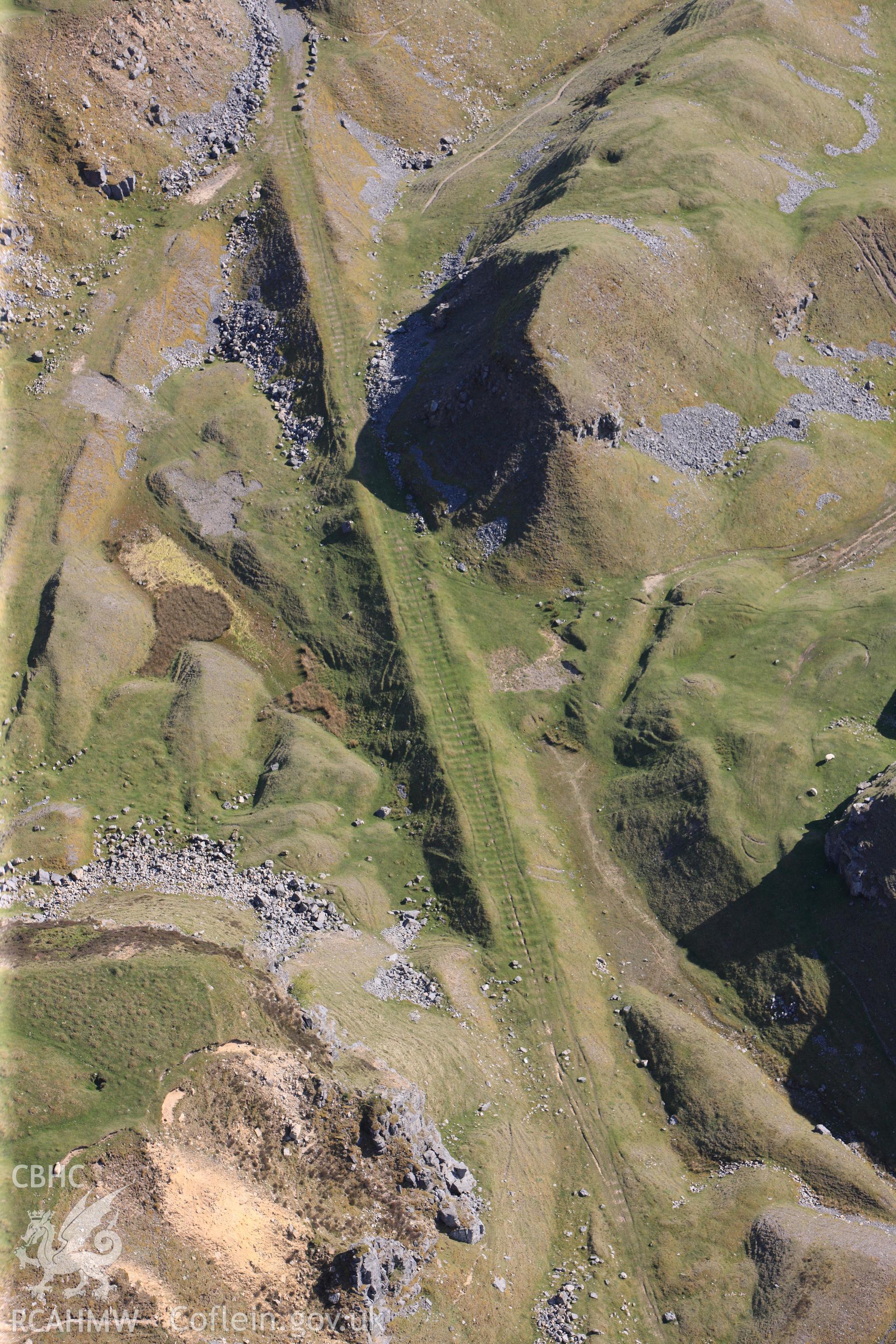 RCAHMW colour oblique photograph of Trefil Quarry, parchmarks of stone sleepers on tramroad. Taken by Toby Driver on 22/05/2012.