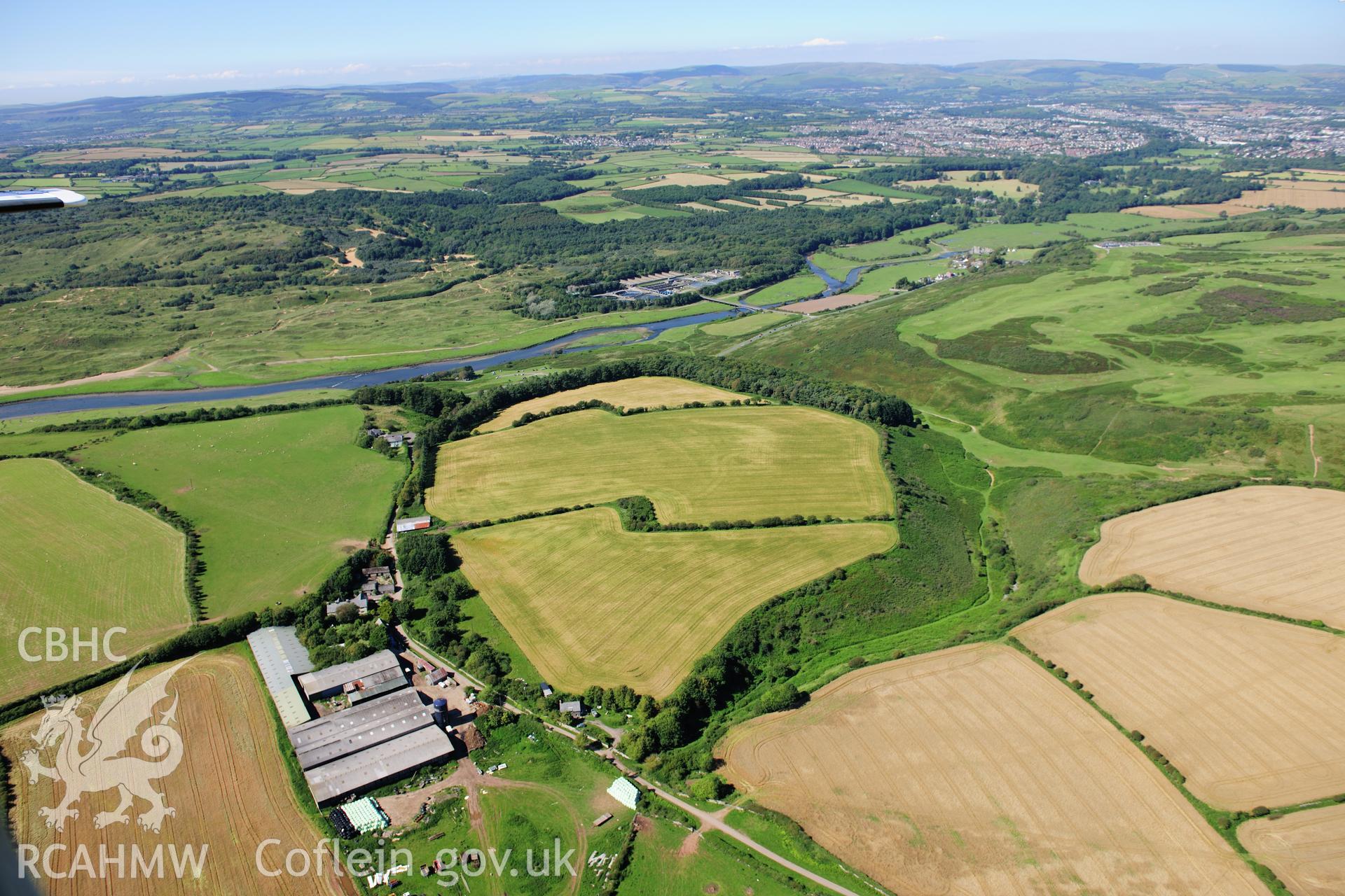 RCAHMW colour oblique photograph of Norton, causewayed enclosure, landscape view from south. Taken by Toby Driver on 24/07/2012.