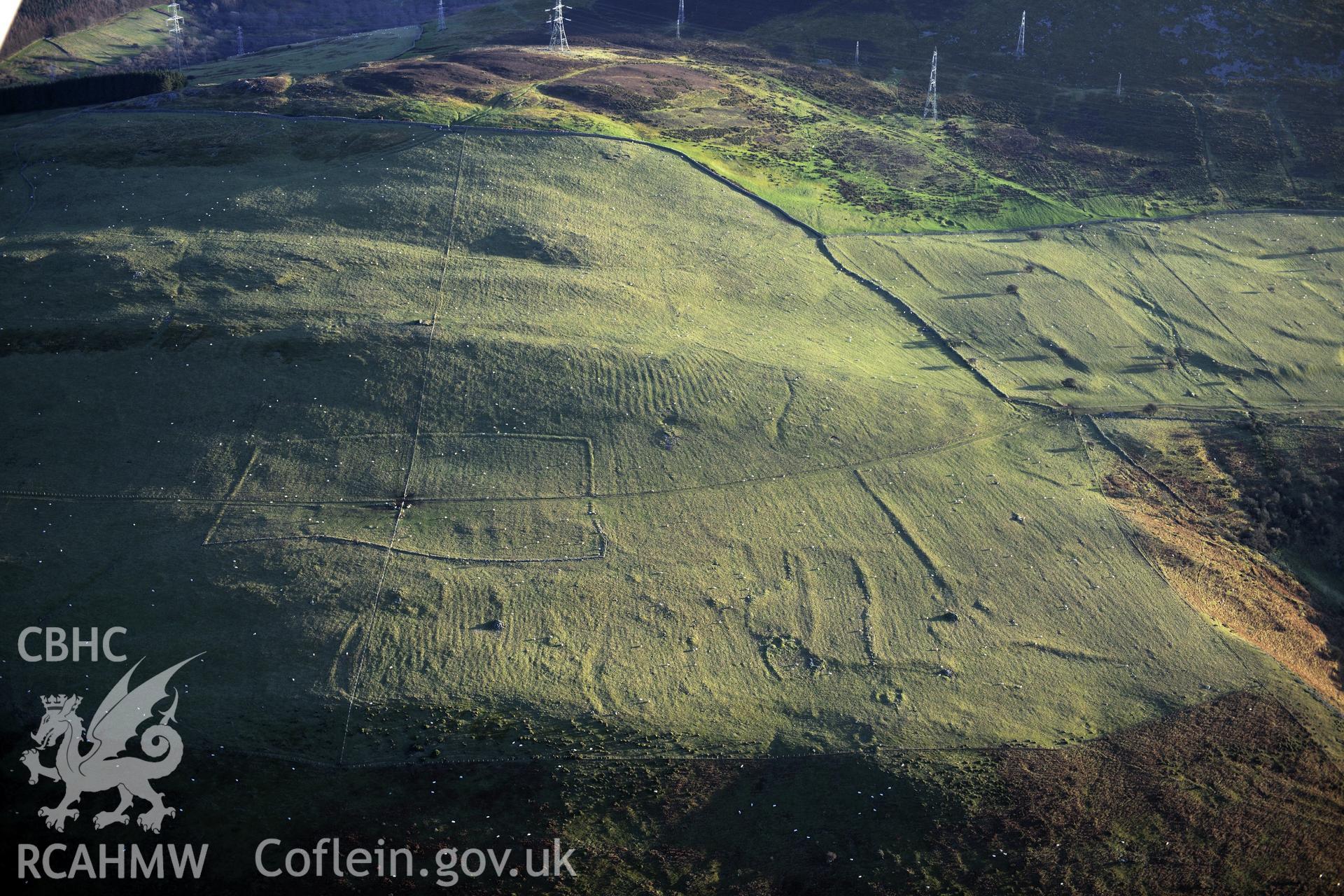 RCAHMW colour oblique photograph of Ffridd Ddu field system, and landscape. Taken by Toby Driver on 10/12/2012.