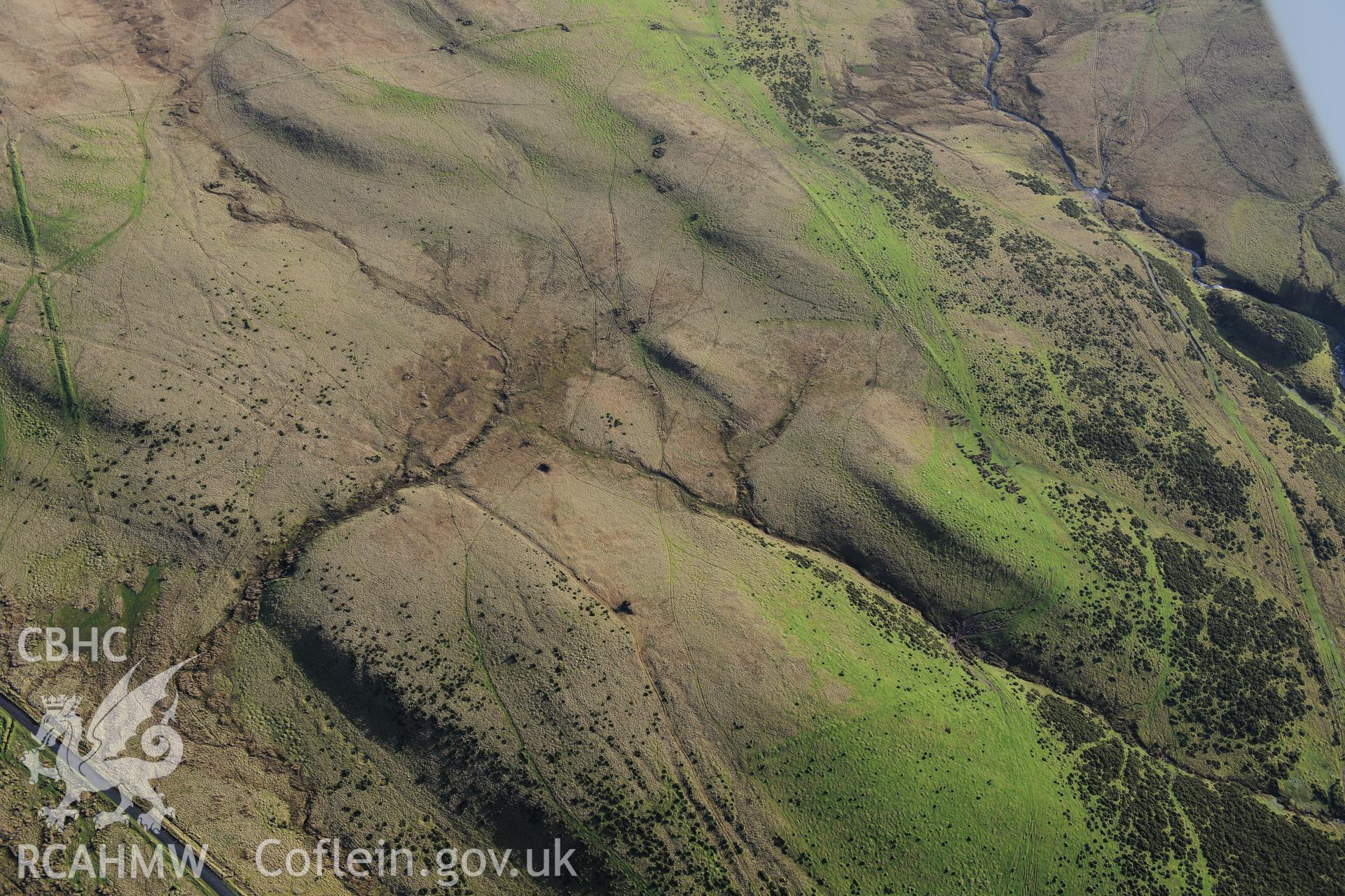 RCAHMW colour oblique photograph of Arosfa Garreg Lwyd Roman camp. Taken by Toby Driver on 23/11/2012.