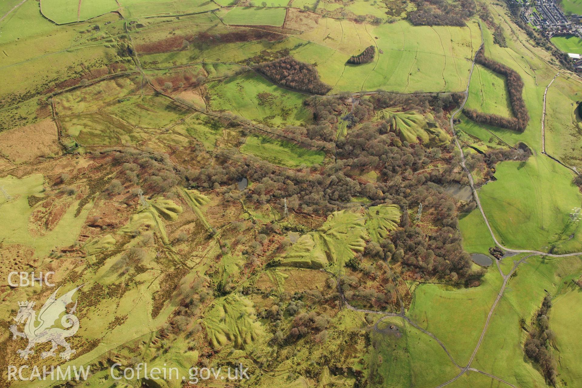 RCAHMW colour oblique photograph of Ironstone levels east of Plymouth Ironworks, industrial landscape. Taken by Toby Driver on 28/11/2012.