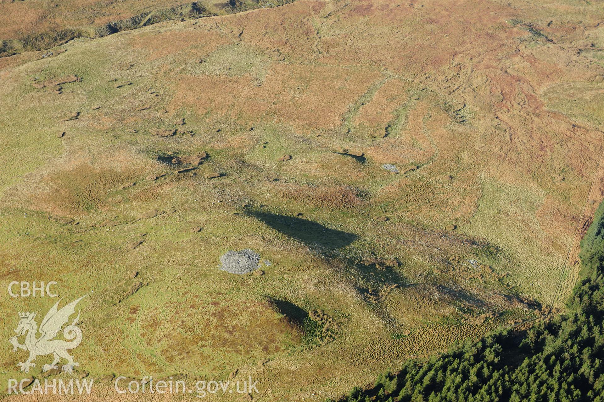 RCAHMW colour oblique photograph of Carn Fflur round barrow cemetery. Taken by Toby Driver on 05/11/2012.