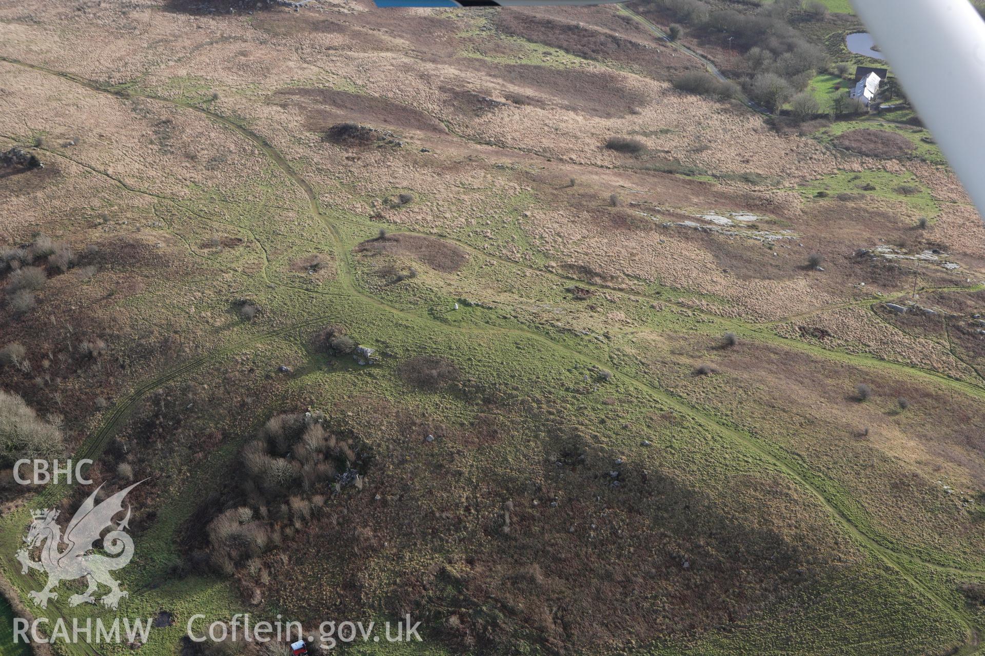 RCAHMW colour oblique photograph of Mynydd Llangyndeyrn, Round Cairns. Taken by Toby Driver on 27/01/2012.