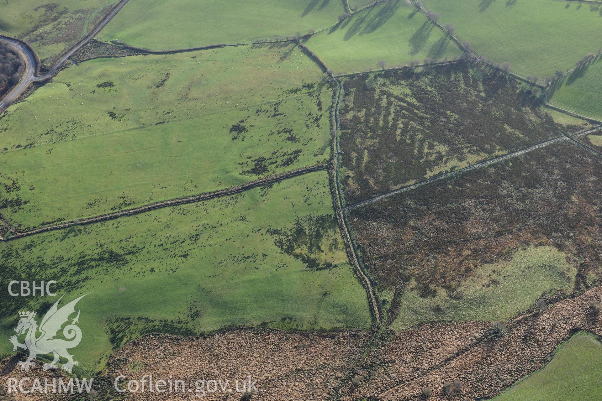 RCAHMW colour oblique photograph of Roman camps north of Caerau, Beulah (site of). Taken by Toby Driver on 23/11/2012.