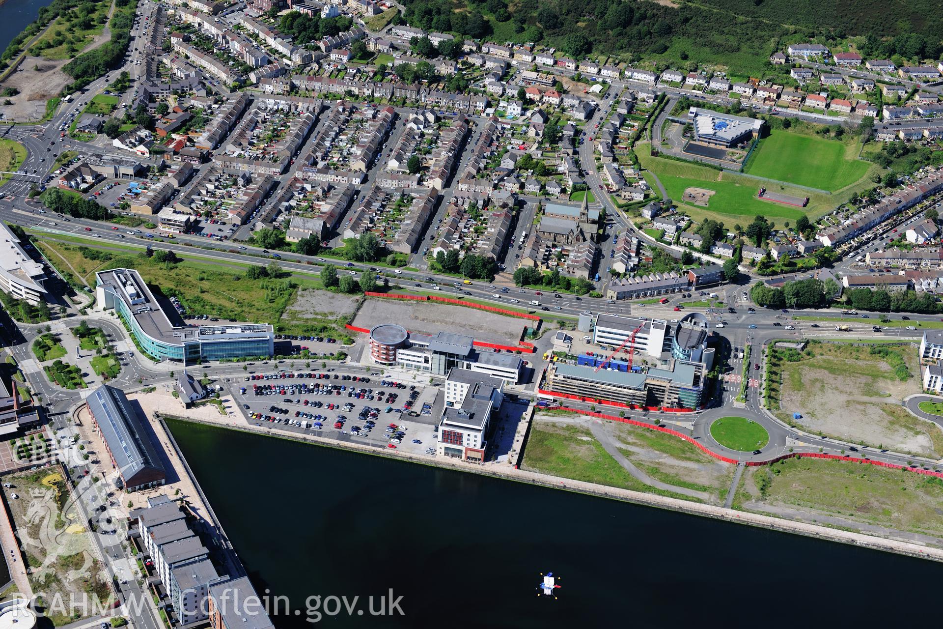 RCAHMW colour oblique photograph of Prince of Wales Dock, Swansea Docks, new buildings on north side. Taken by Toby Driver on 24/07/2012.