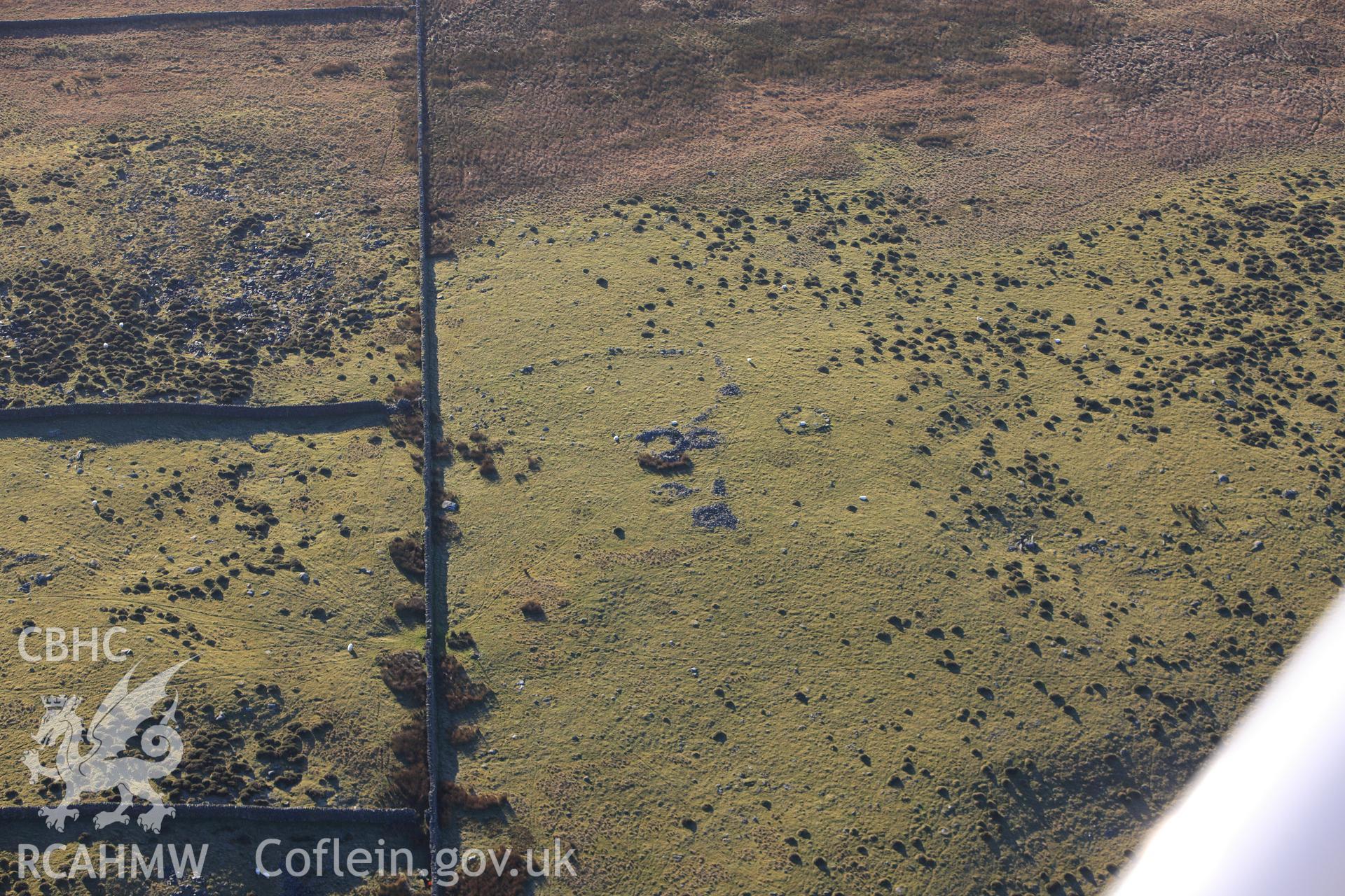 RCAHMW colour oblique photograph of Mynydd Egryn, hut circle settlement. Taken by Toby Driver on 10/12/2012.