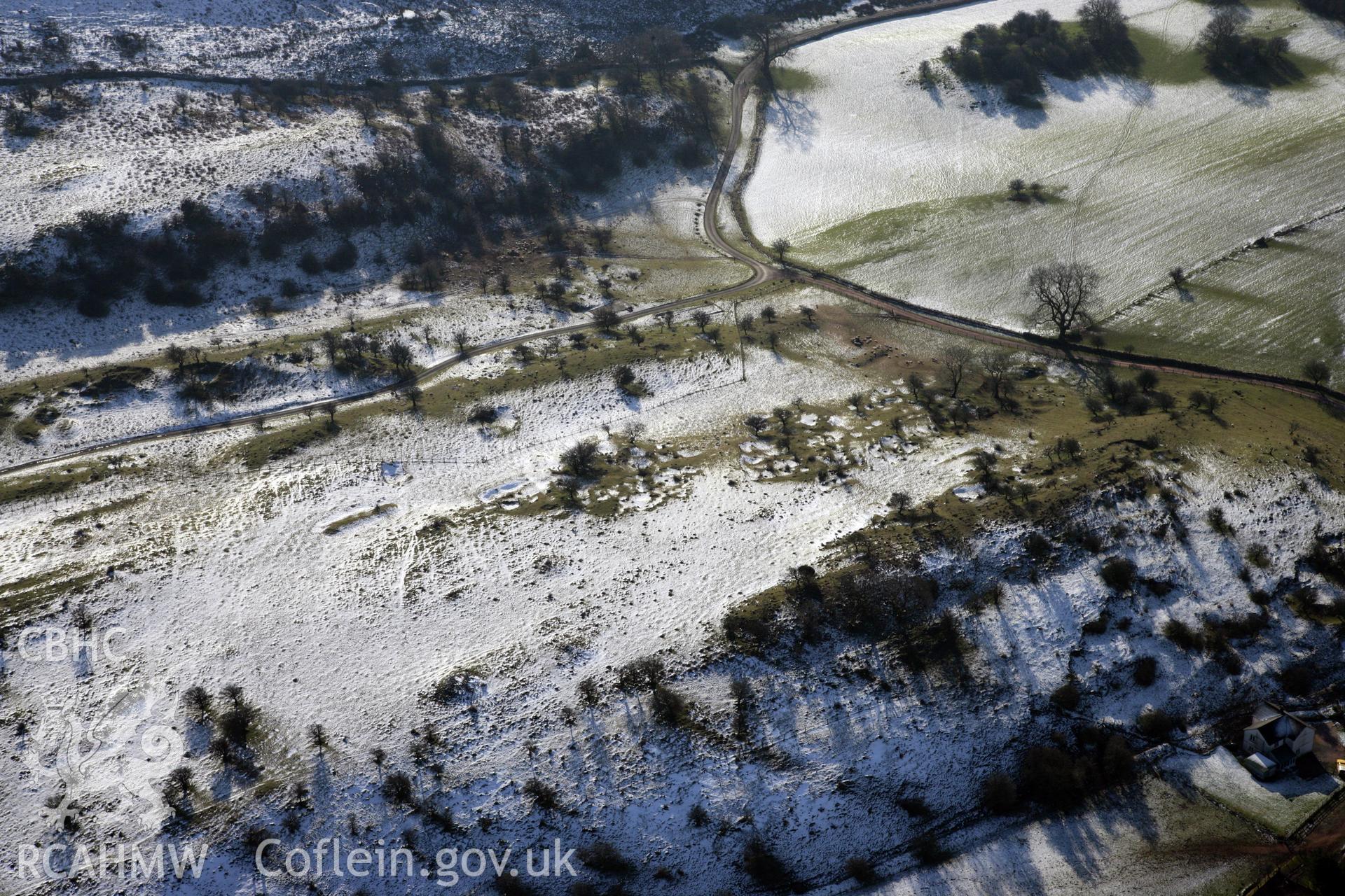 RCAHMW colour oblique photograph of Beddau'r Derwyddon Pillow Mound B. Taken by Toby Driver on 02/02/2012.