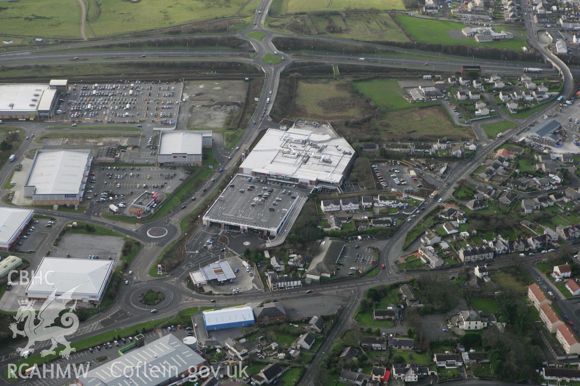 RCAHMW colour oblique photograph of Holyhead, town, view of retail park from east. Taken by Toby Driver on 13/01/2012.