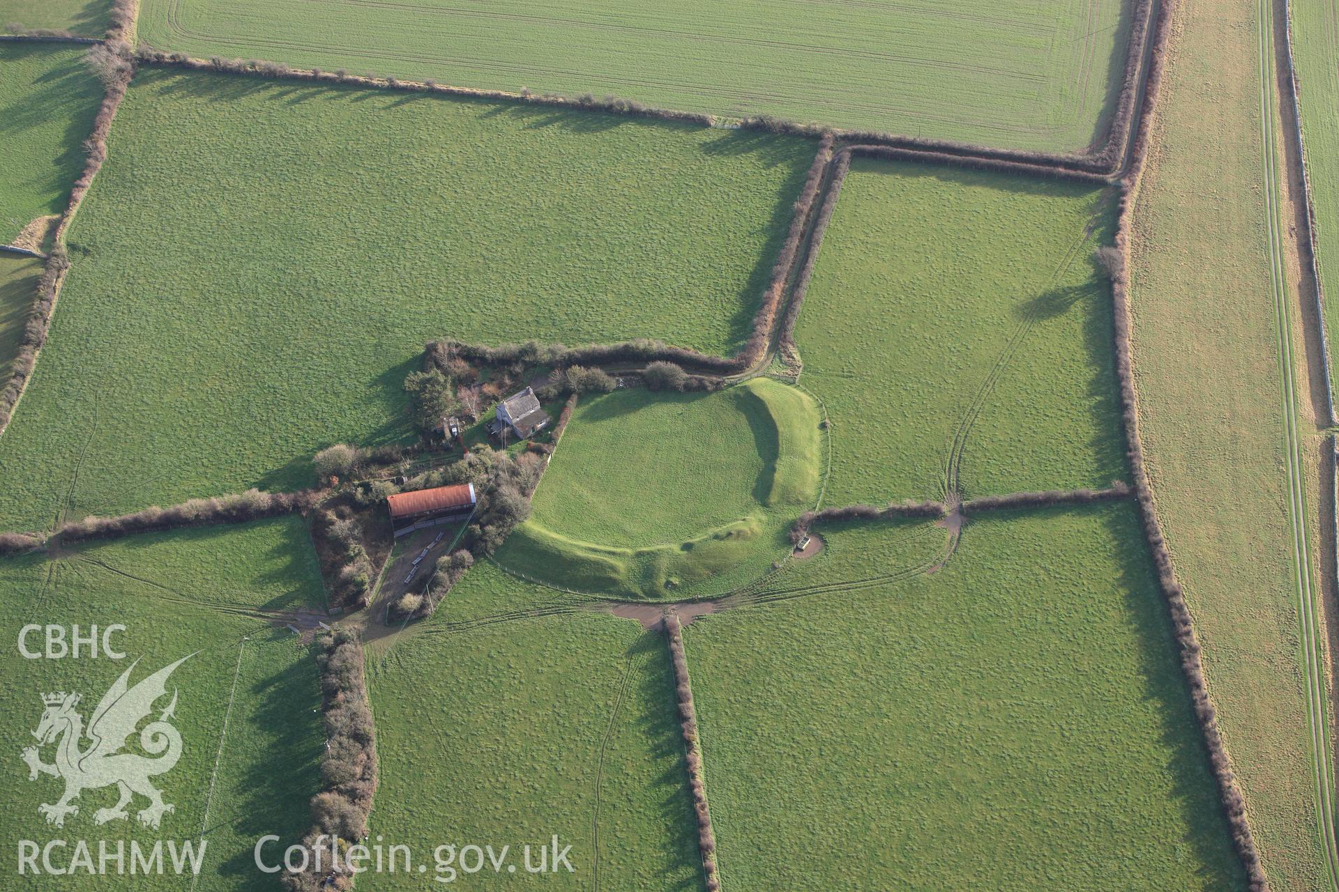 RCAHMW colour oblique photograph of Castell Bryn gwyn, in low winter light. Taken by Toby Driver on 13/01/2012.