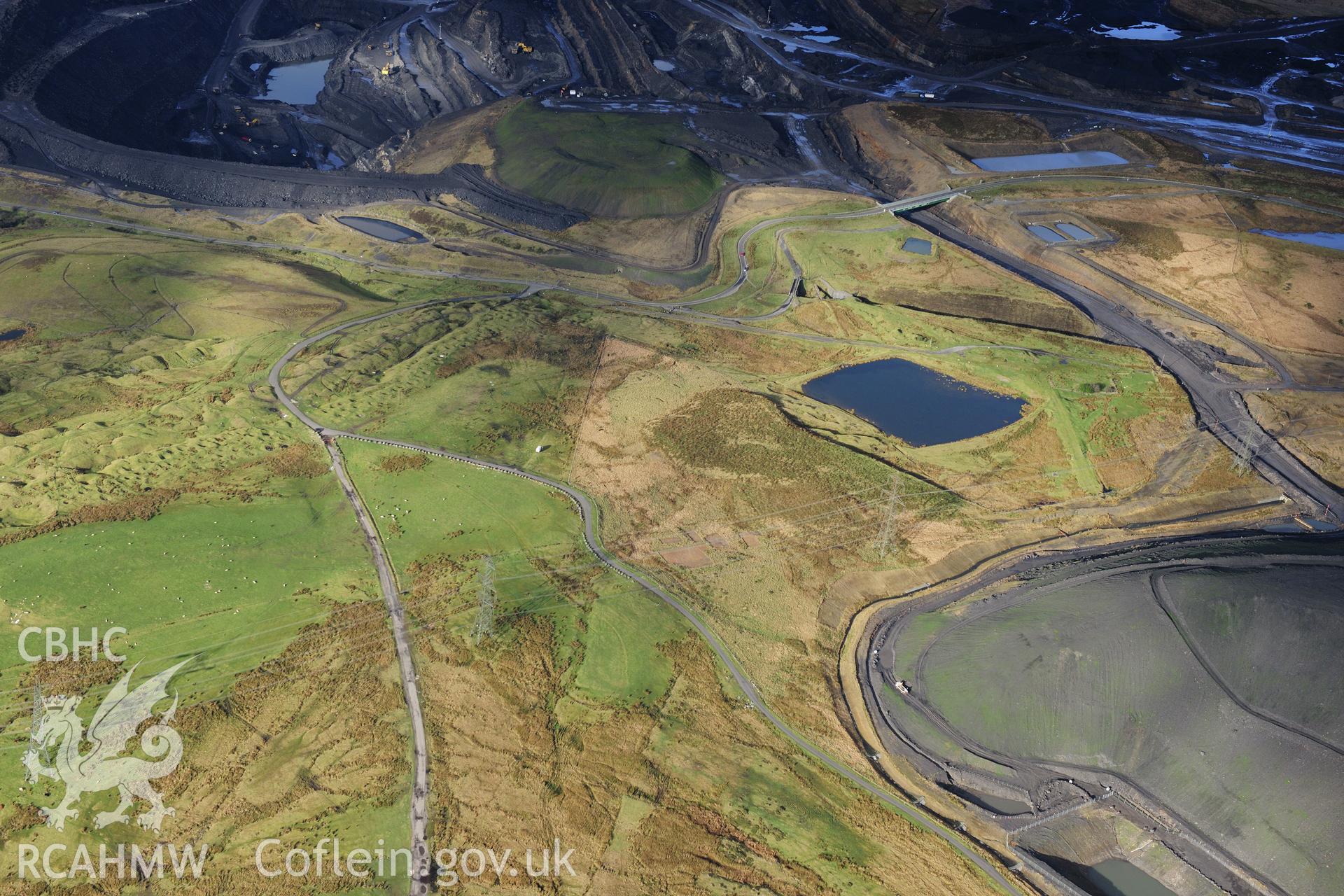 RCAHMW colour oblique photograph of Sarn Howell pond and industrial landscape. Taken by Toby Driver on 28/11/2012.