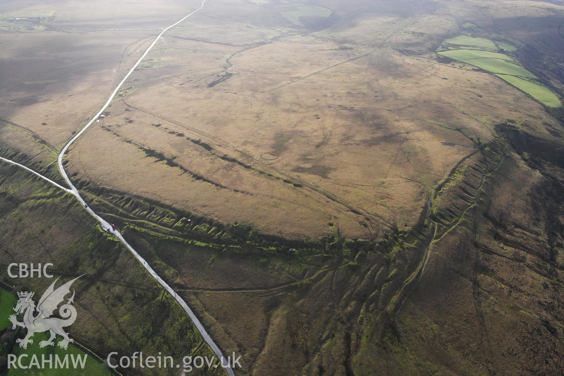 RCAHMW colour oblique photograph of Ring Cairn on Tor Clawdd. Taken by Toby Driver on 27/01/2012.