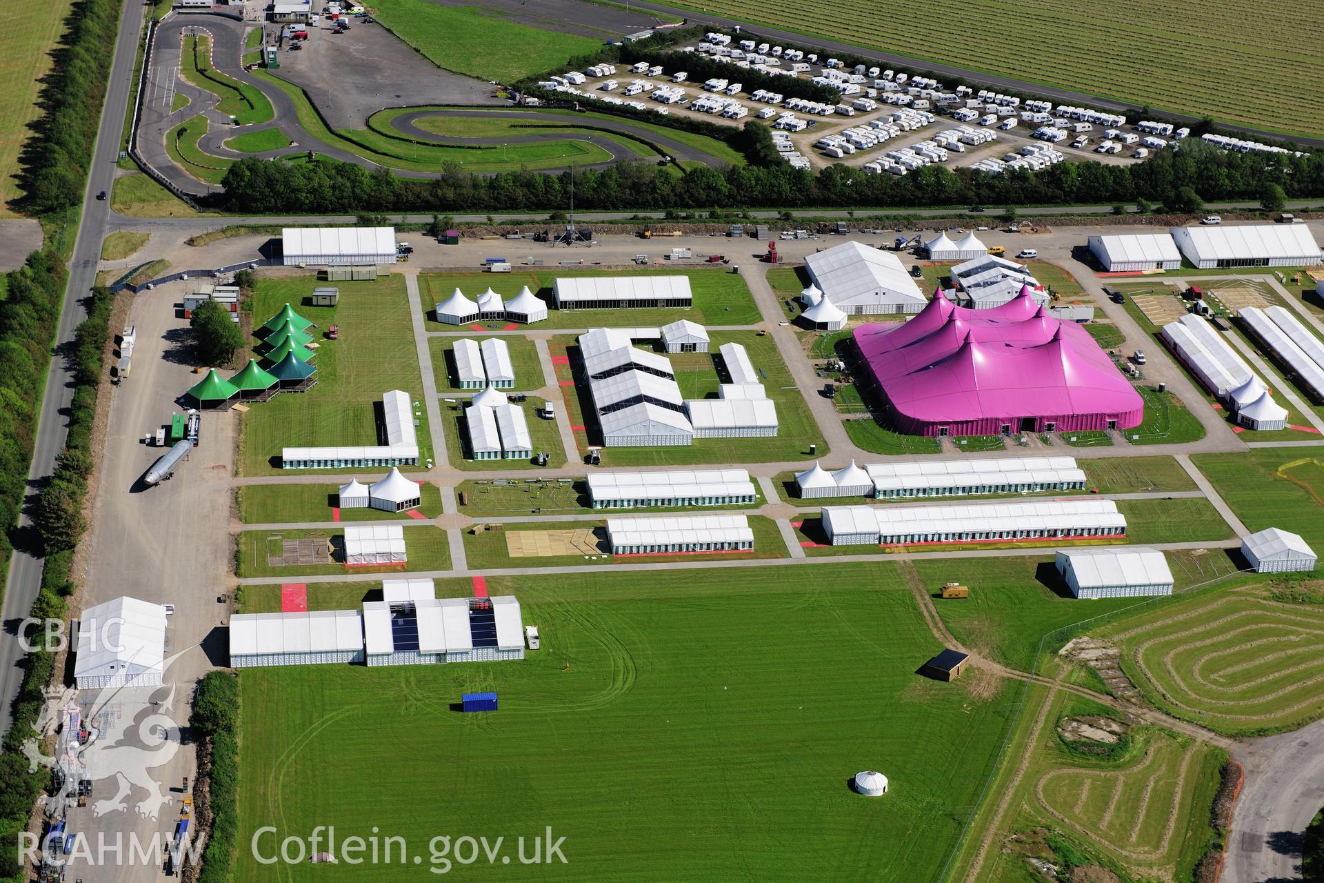 RCAHMW colour oblique photograph of Llandow Airfield, site of the 2012 National Eisteddfod of Wales. Taken by Toby Driver on 24/07/2012.