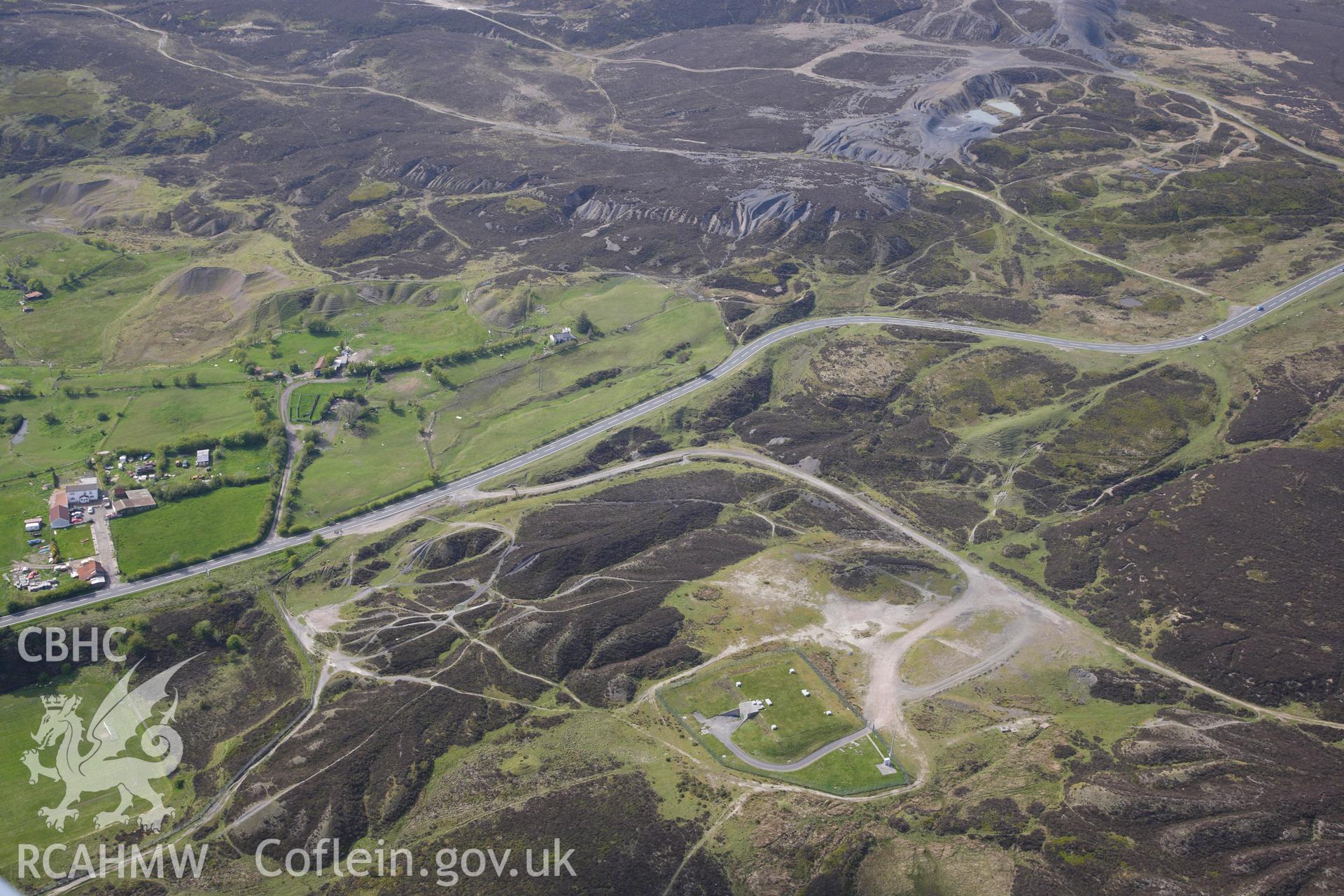 RCAHMW colour oblique photograph of Pen-ffordd-goch iron and coal workings and patching. Taken by Toby Driver on 22/05/2012.