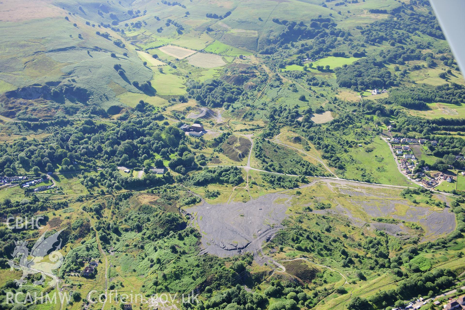 RCAHMW colour oblique photograph of British Ironworks, general view. Taken by Toby Driver on 24/07/2012.