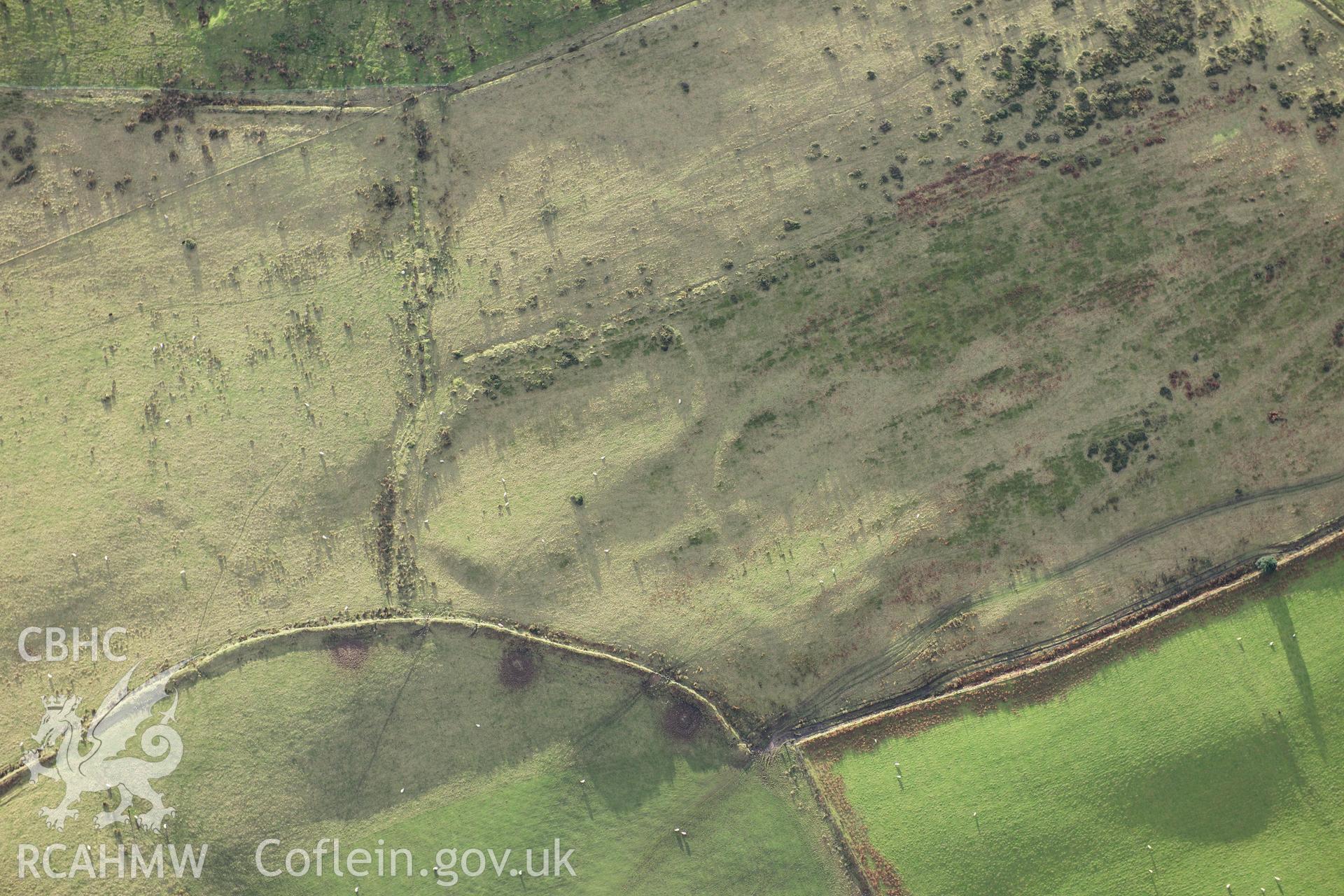 RCAHMW colour oblique photograph of Foel Fynyddau, deserted rural settlement west of scheduled remains. Taken by Toby Driver on 28/11/2012.