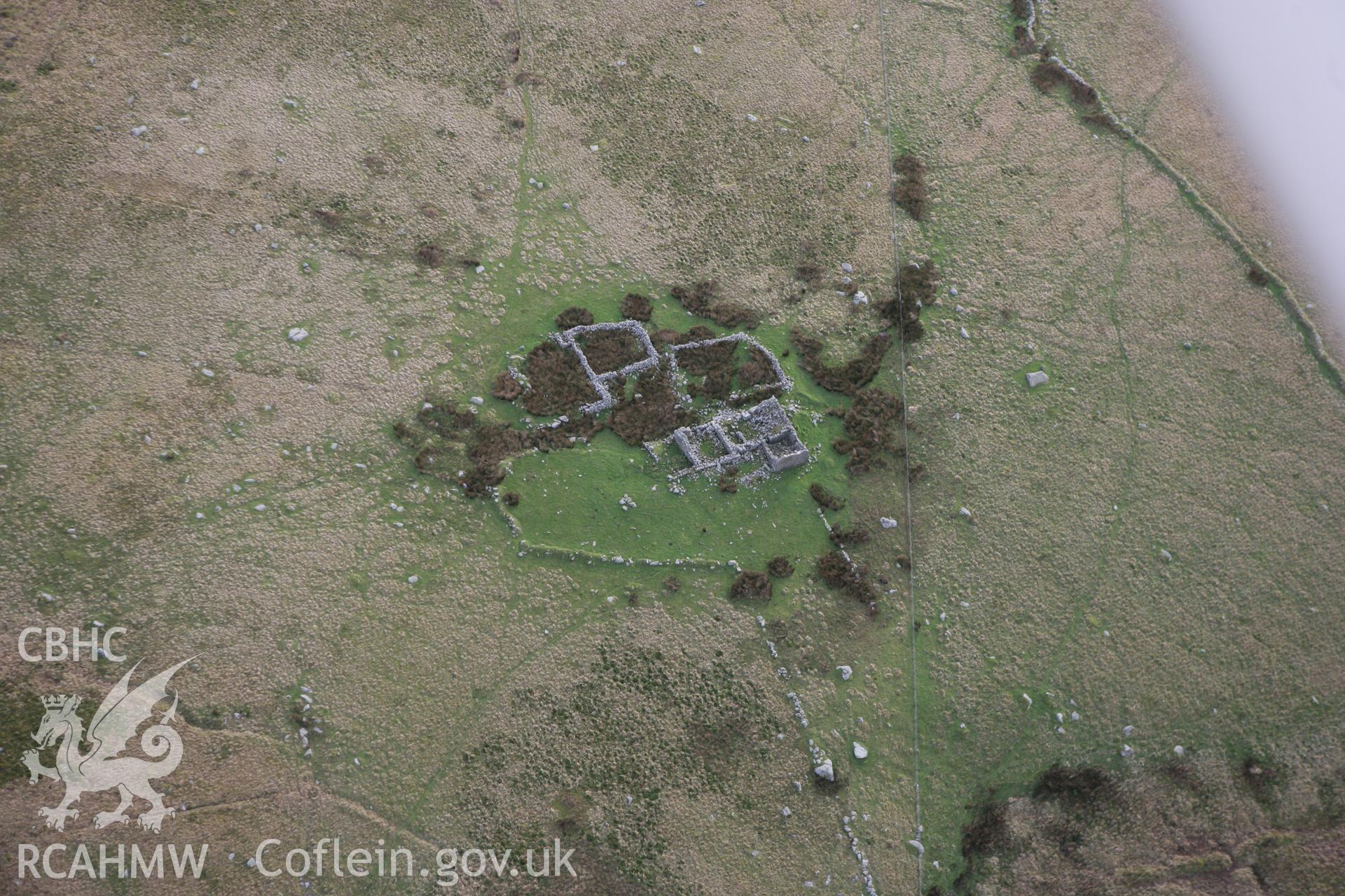 RCAHMW colour oblique photograph of Ty'n Rhos farmstead, ruins. Taken by Toby Driver on 13/01/2012.