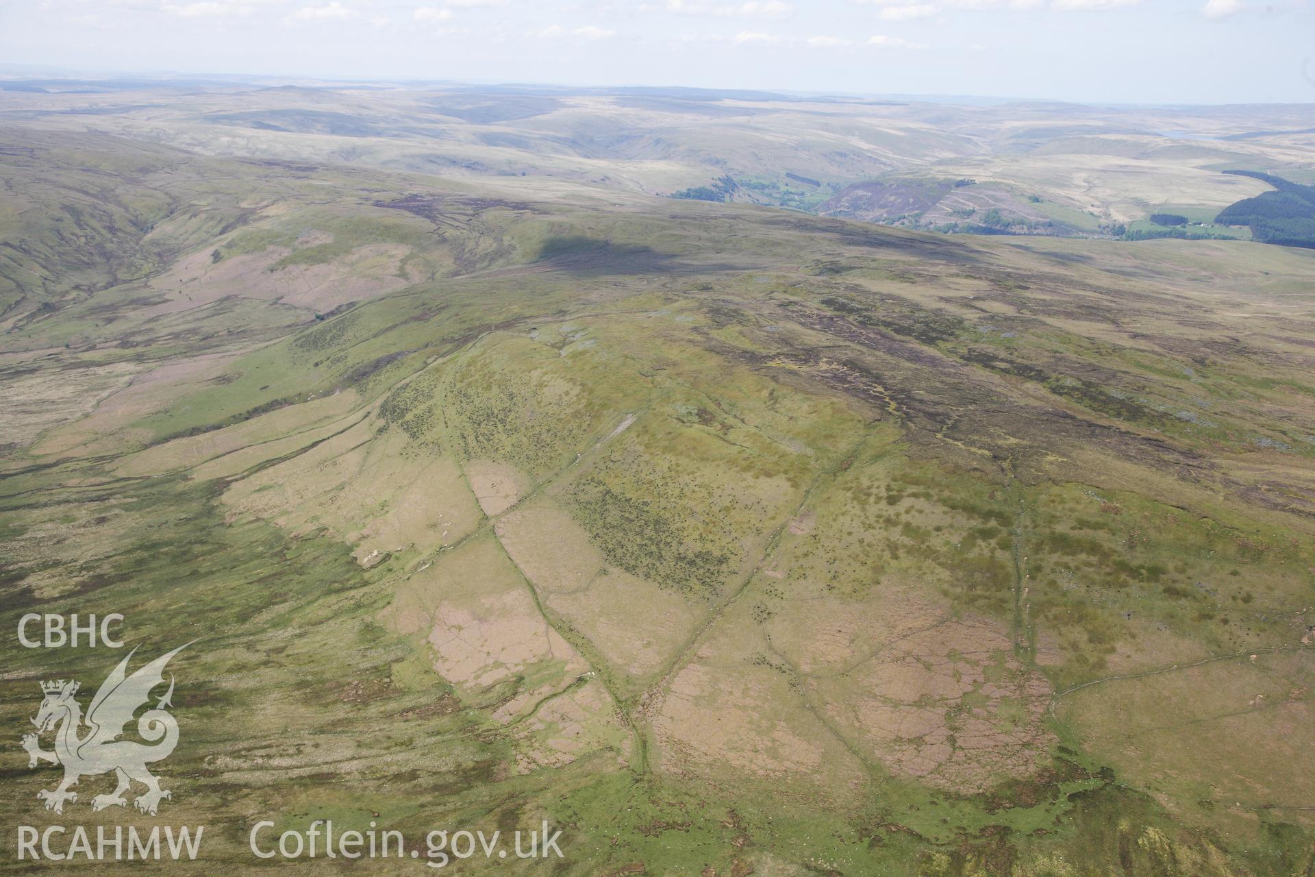 RCAHMW colour oblique photograph of Landscape view of  Three Round Cairns on Gamriw. Taken by Toby Driver on 28/05/2012.