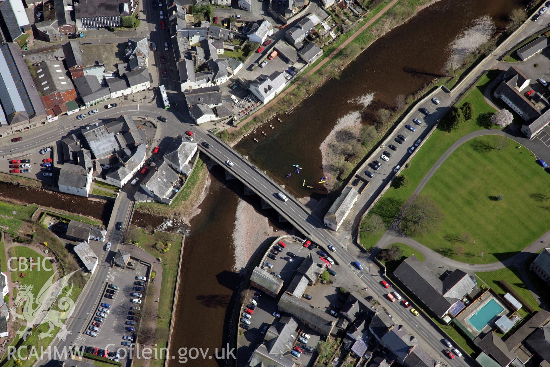 RCAHMW colour oblique photograph of Brecon Bridge, Usk Road Bridge. Taken by Toby Driver and Oliver Davies on 28/03/2012.