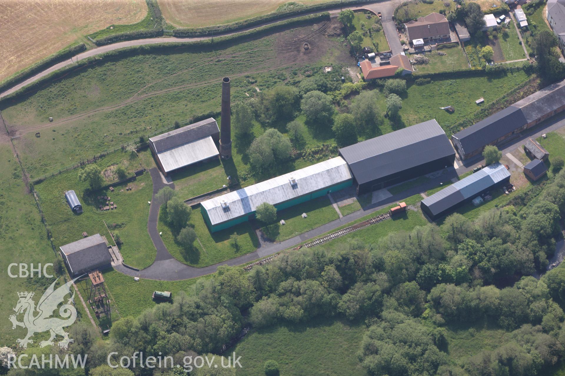 RCAHMW colour oblique photograph of Close view of Kidwelly tinplate works, looking south east. Taken by Toby Driver on 24/05/2012.