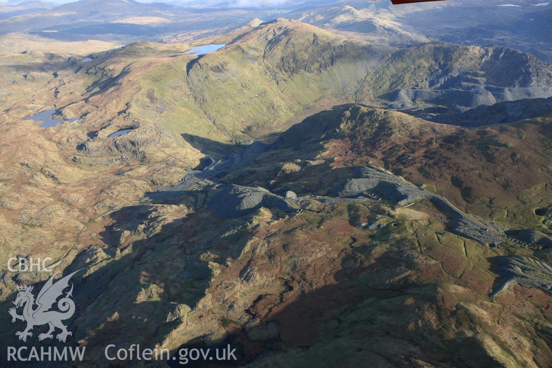 RCAHMW colour oblique photograph of Rhosydd slate quarry, upper workings. Taken by Toby Driver on 13/01/2012.