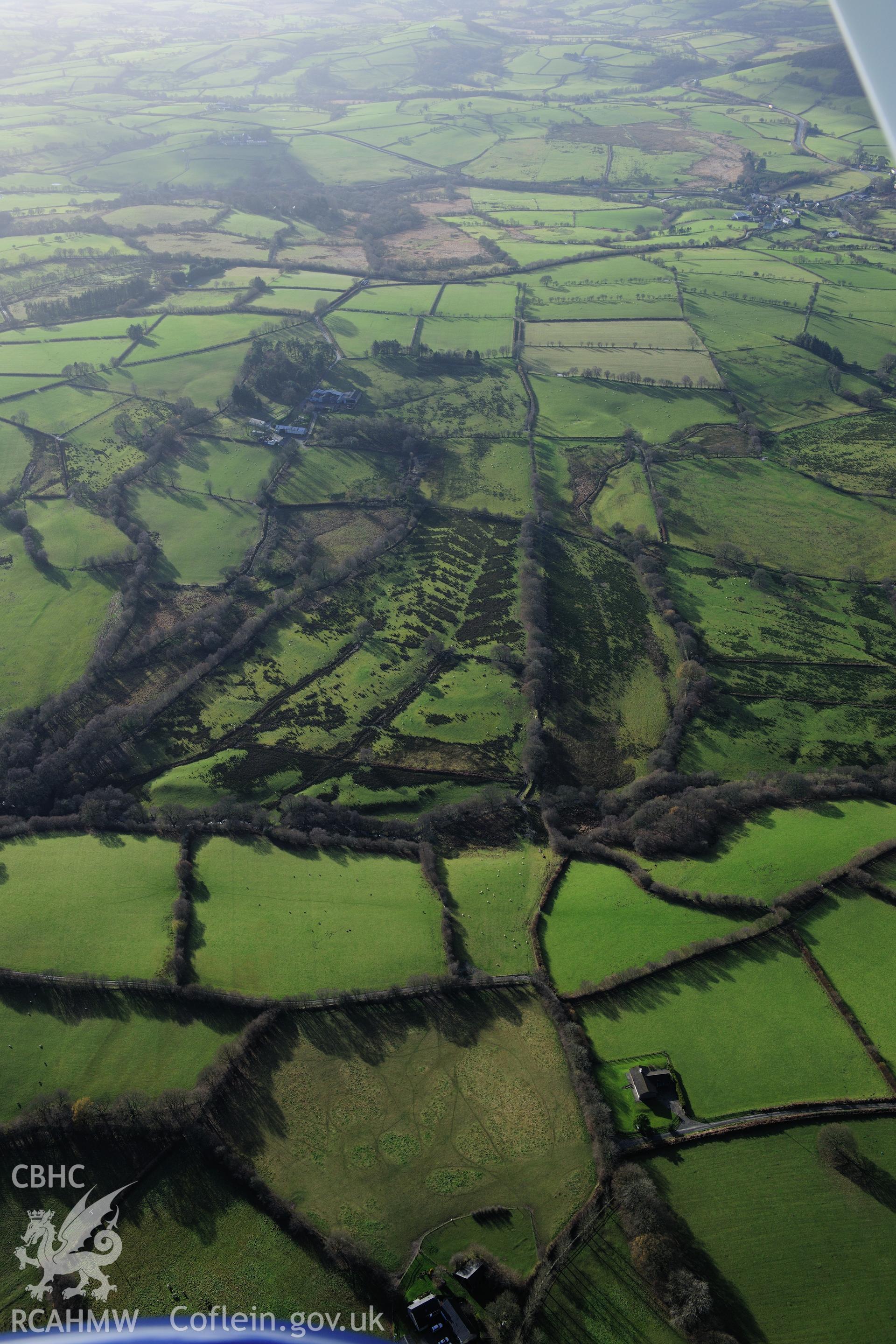 RCAHMW colour oblique photograph of Segment of Roman road north of Tynewydd. Taken by Toby Driver on 23/11/2012.