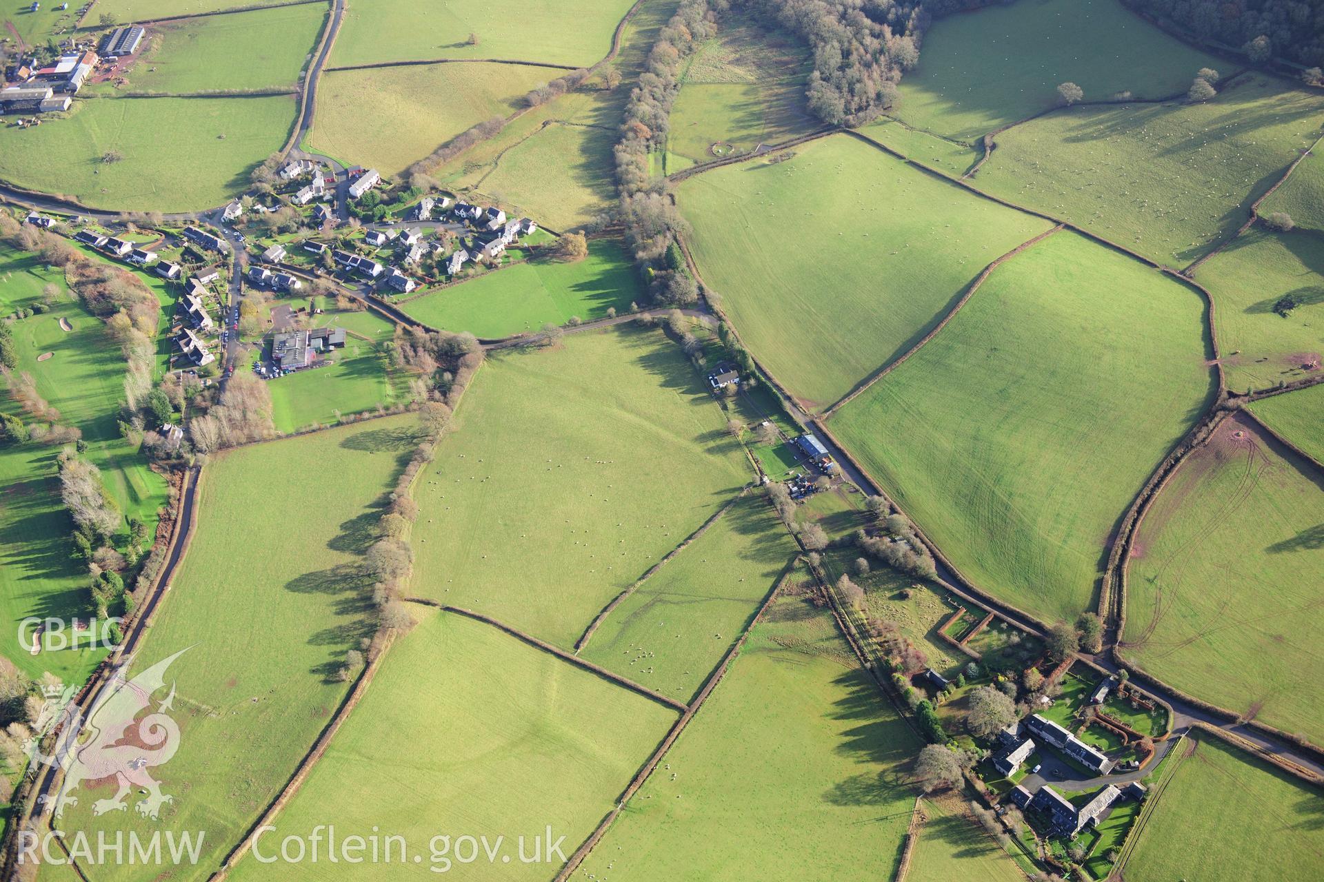 RCAHMW colour oblique photograph of Pool Farm - Cradoc, holloway. Taken by Toby Driver on 23/11/2012.