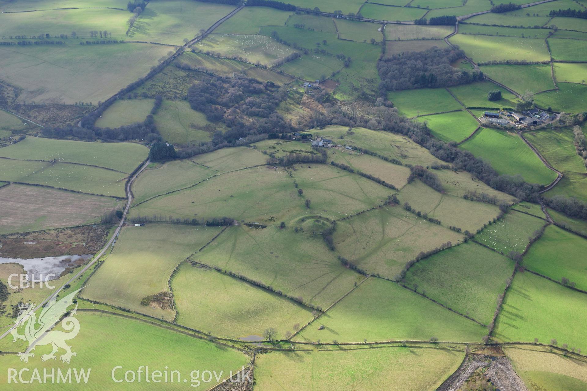 RCAHMW colour oblique photograph of Cwm Camlais motte. Taken by Toby Driver on 28/11/2012.