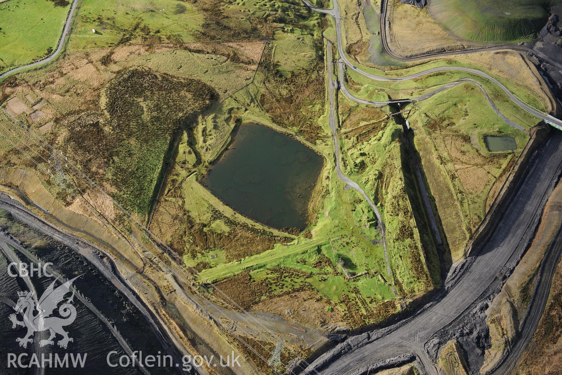 RCAHMW colour oblique photograph of Sarn Howell pond and industrial landscape. Taken by Toby Driver on 28/11/2012.