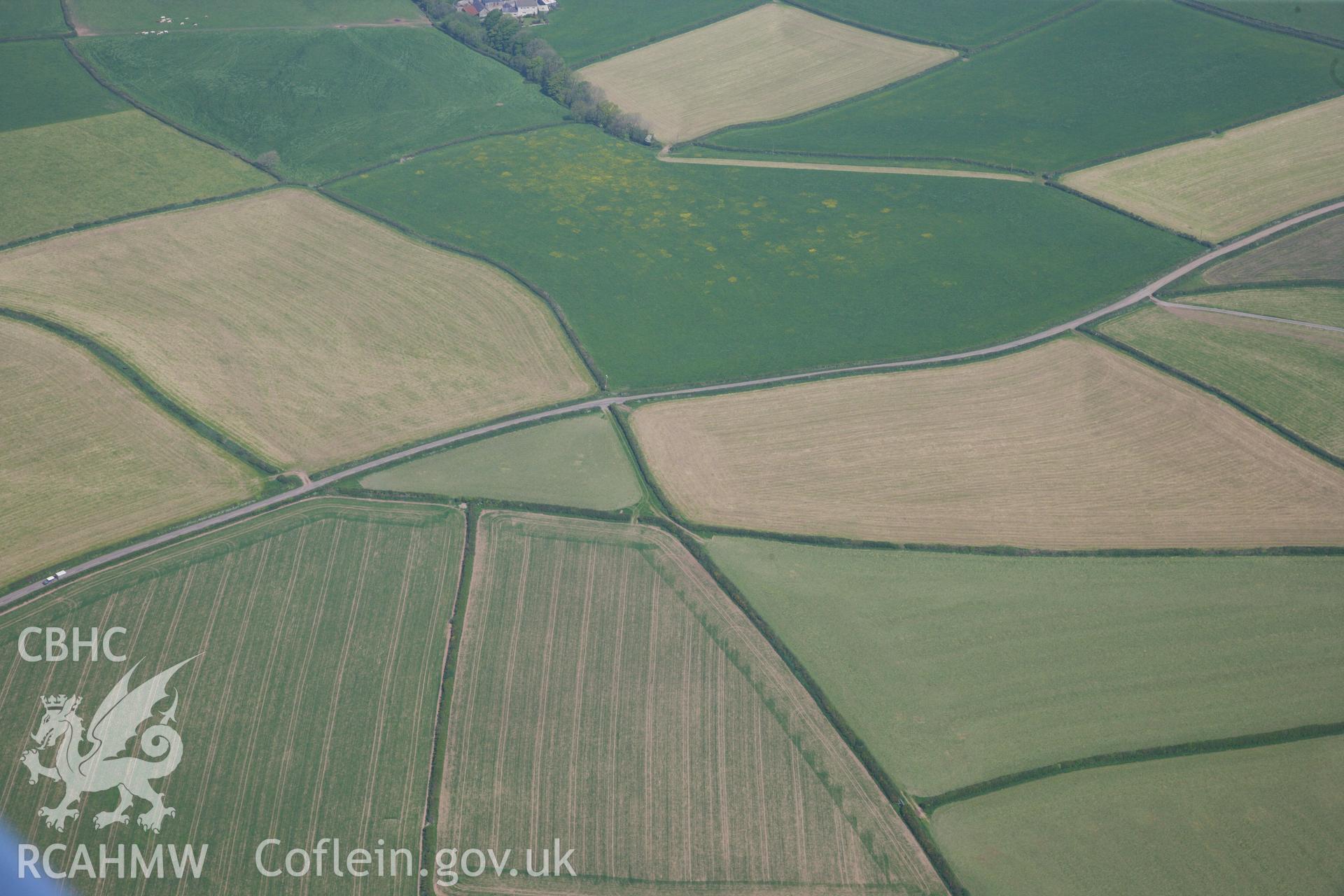 RCAHMW colour oblique photograph of General view of Pen-yr-Heol round barrow, looking north. Taken by Toby Driver on 24/05/2012.