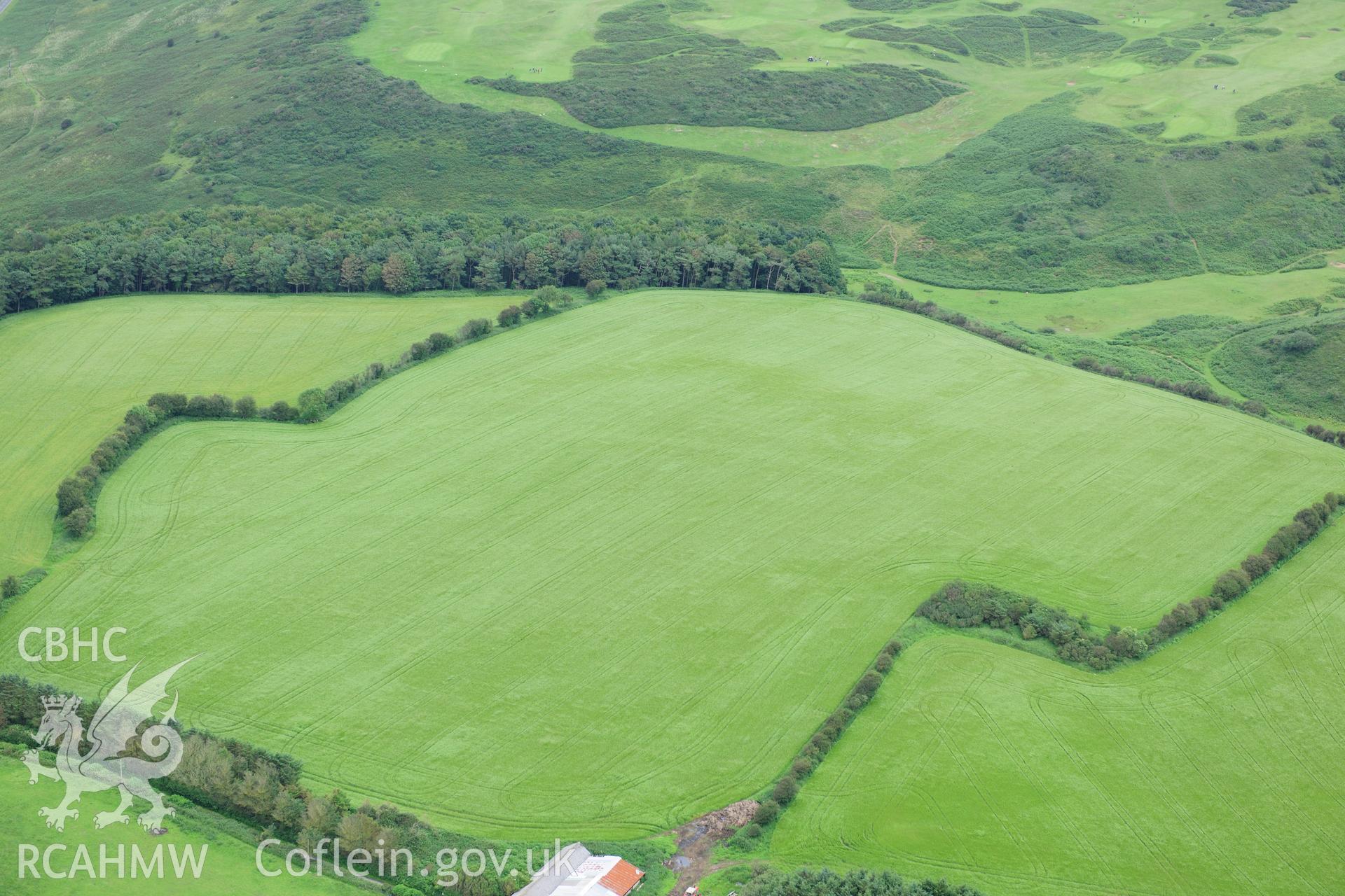 RCAHMW colour oblique photograph of Norton Interrupted Ditch Enclosure. Taken by Toby Driver on 05/07/2012.