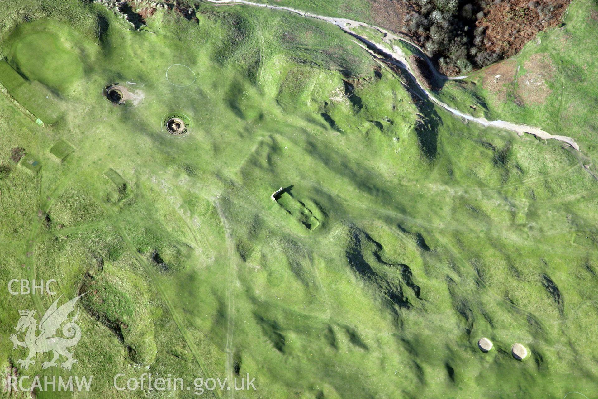 RCAHMW colour oblique photograph of Pennard deserted settlement and Pennard castle and church. Taken by Toby Driver on 02/02/2012.