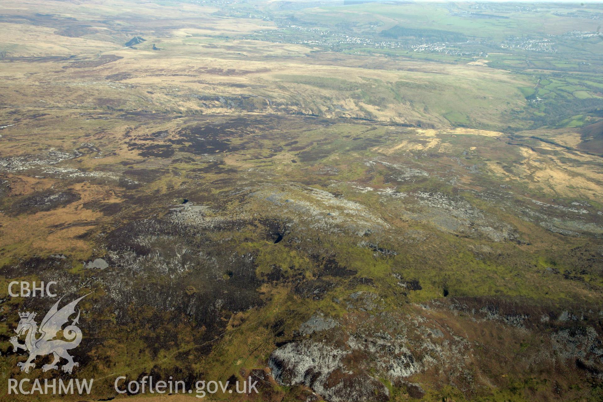 RCAHMW colour oblique photograph of Tair Carn Uchaf, high landscape looking south. Taken by Toby Driver and Oliver Davies on 28/03/2012.