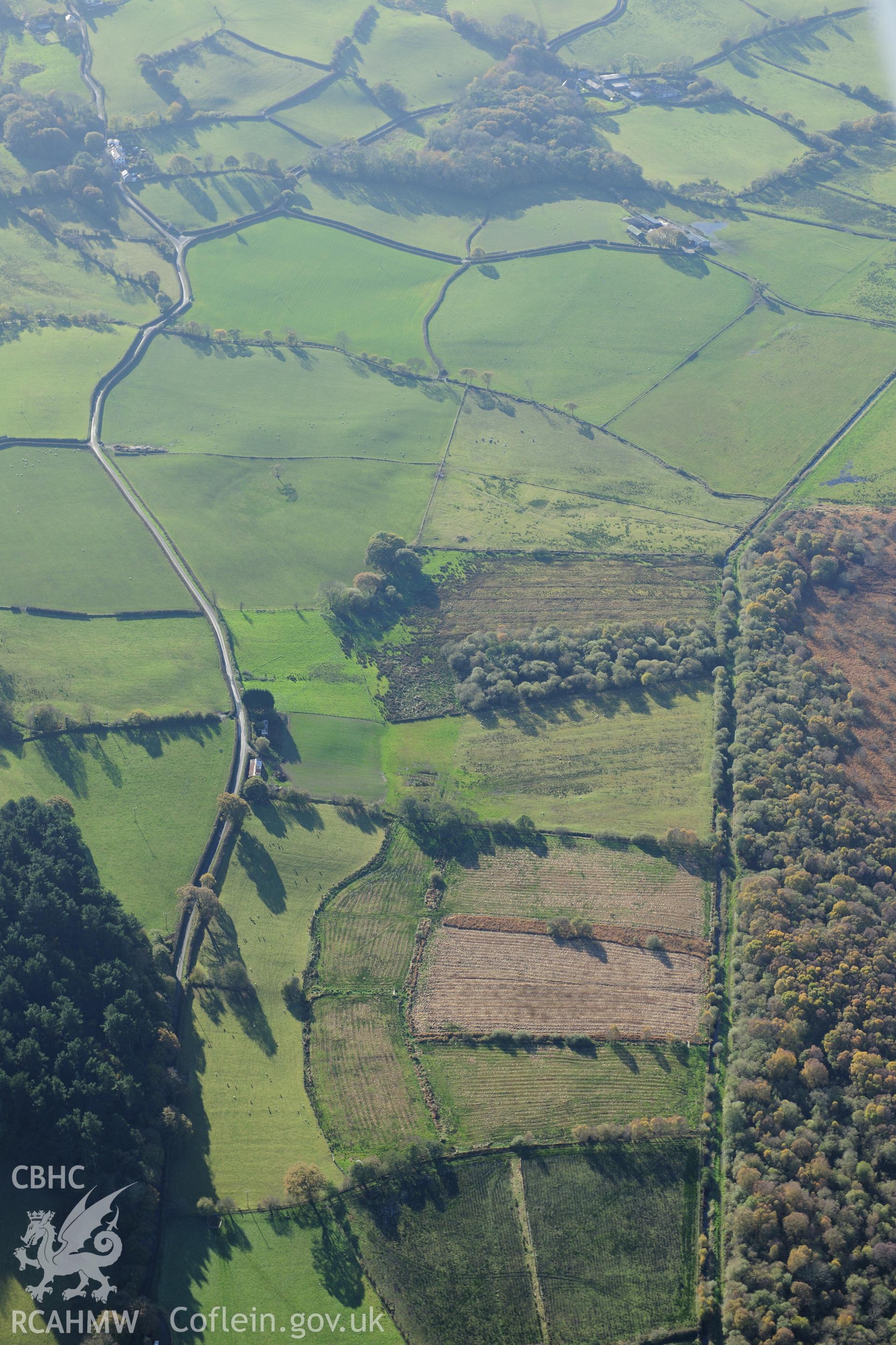 RCAHMW colour oblique photograph of Llangynfelin timber trackway (site of), from north-east. Taken by Toby Driver on 05/11/2012.