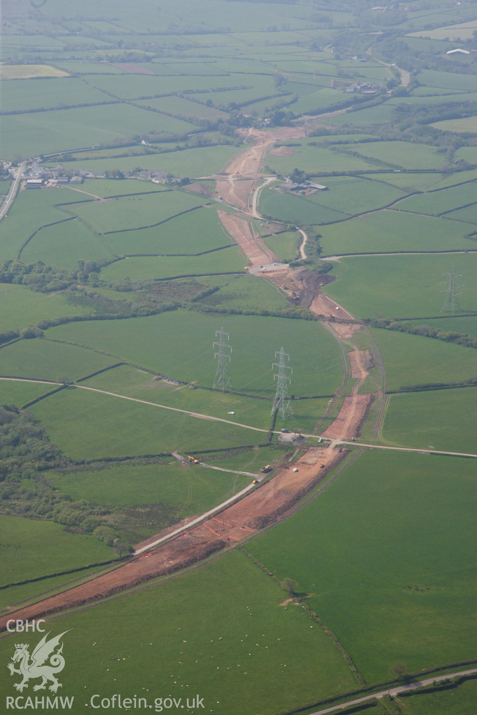 RCAHMW colour oblique photograph of General view of construction of new bypass to Pembroke Dock, looking south west towards Red Roses. Taken by Toby Driver on 24/05/2012.