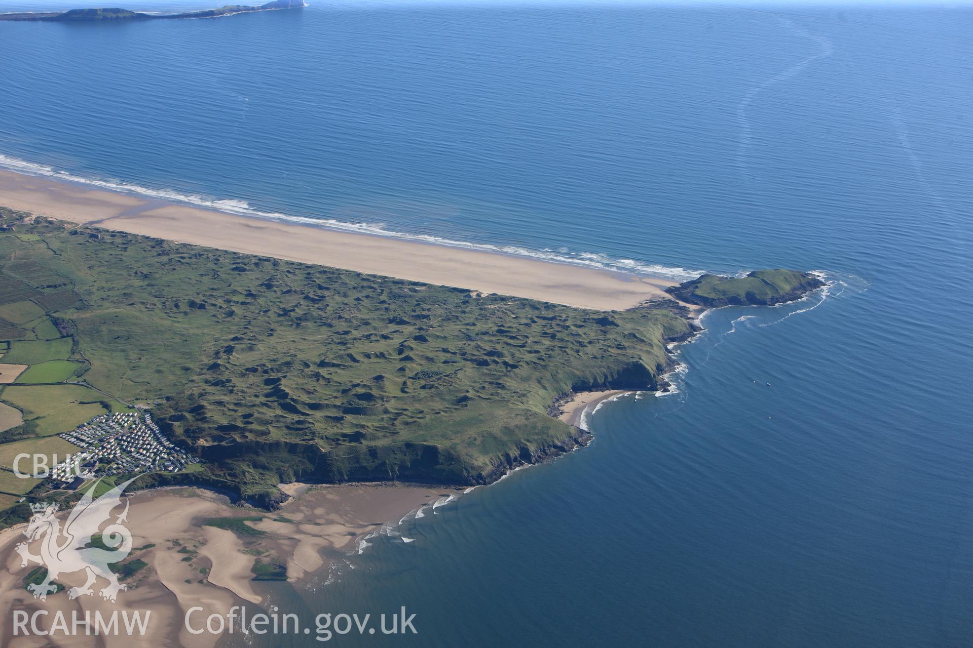 RCAHMW colour oblique photograph of West Gower, high landscape view over Burry Holms. Taken by Toby Driver on 24/07/2012.