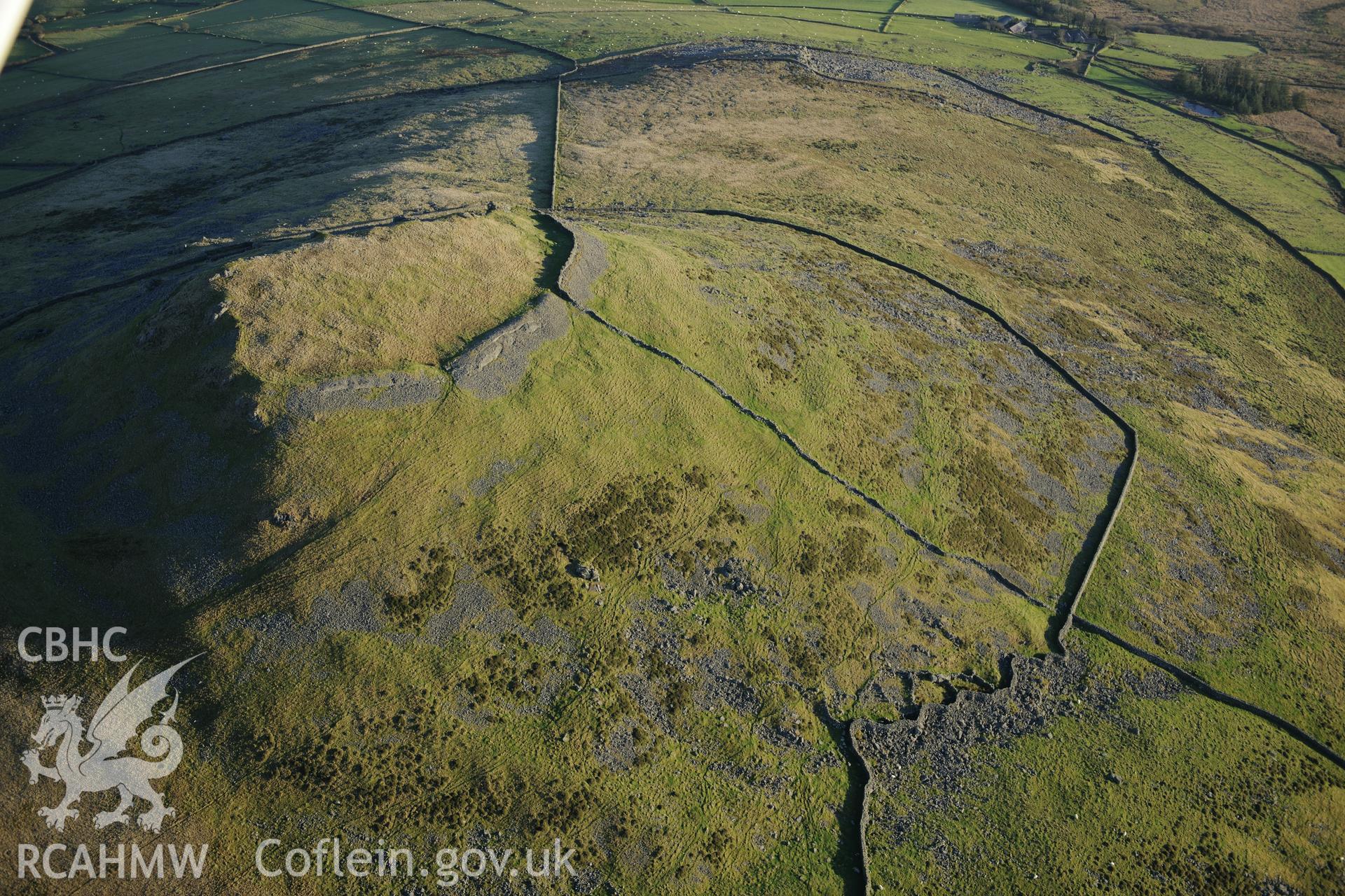 RCAHMW colour oblique photograph of Pen y Gaer hillfort. Taken by Toby Driver on 10/12/2012.