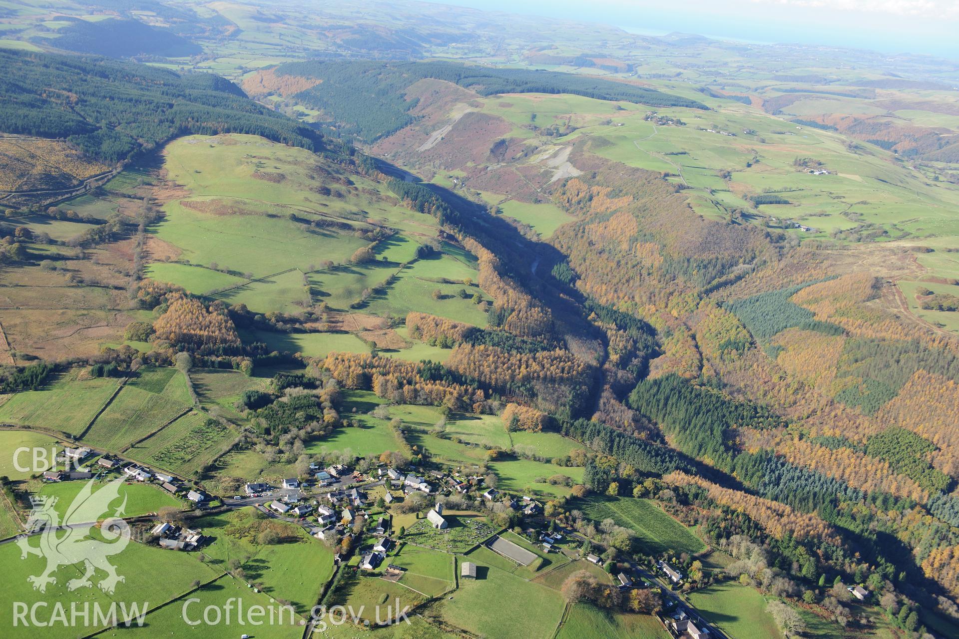 RCAHMW colour oblique photograph of Ysbyty Ystwyth village, landscape looking west to Grogwynion lead mine with autumn colours. Taken by Toby Driver on 05/11/2012.