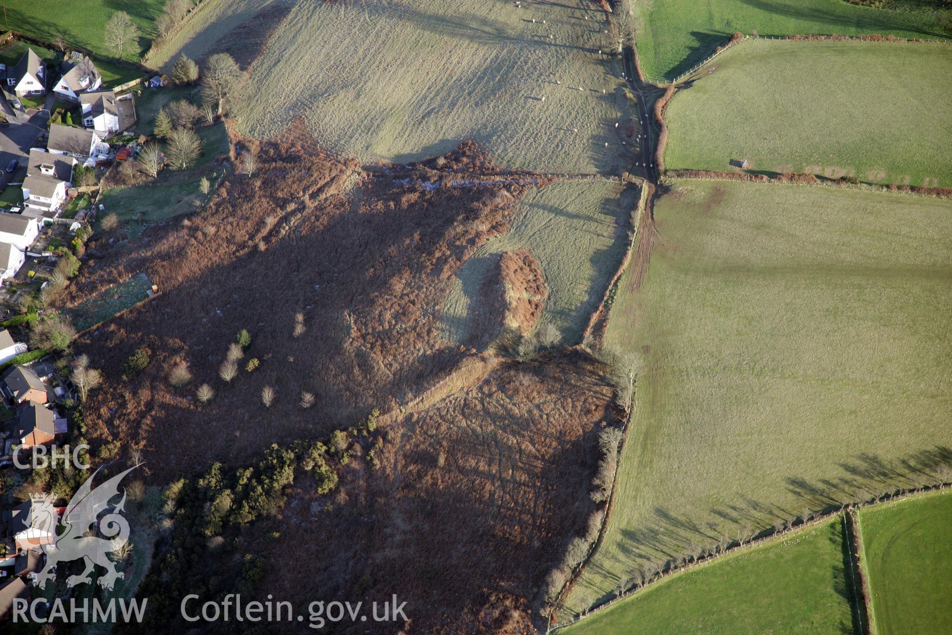 RCAHMW colour oblique photograph of Dan-Y-Lan Mound (Hen Gastell). Taken by Toby Driver on 02/02/2012.