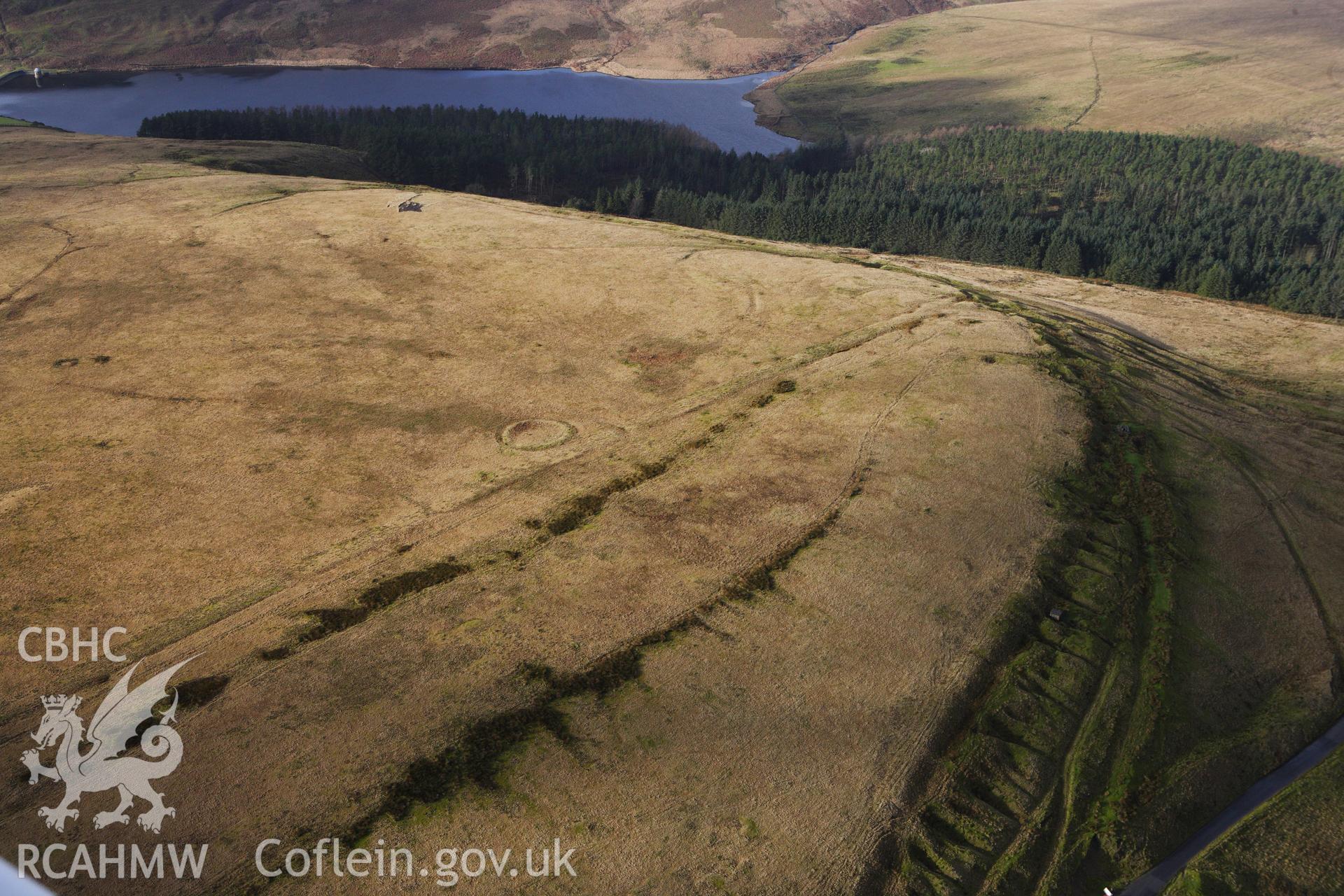 RCAHMW colour oblique photograph of Ring Cairn on Tor Clawdd. Taken by Toby Driver on 27/01/2012.