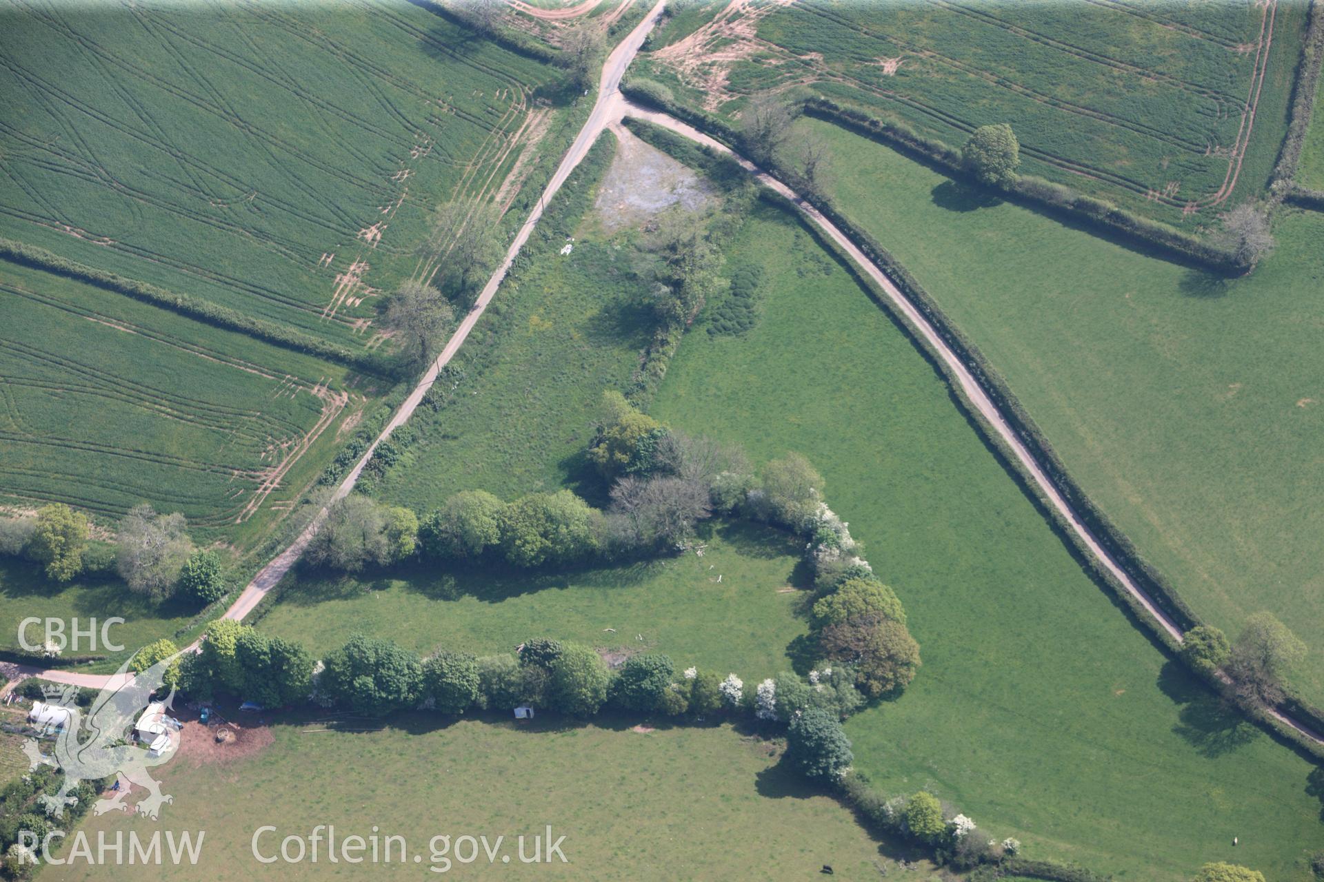 RCAHMW colour oblique photograph of General view of Maen Melyn standing stone, looking east. Taken by Toby Driver on 24/05/2012.